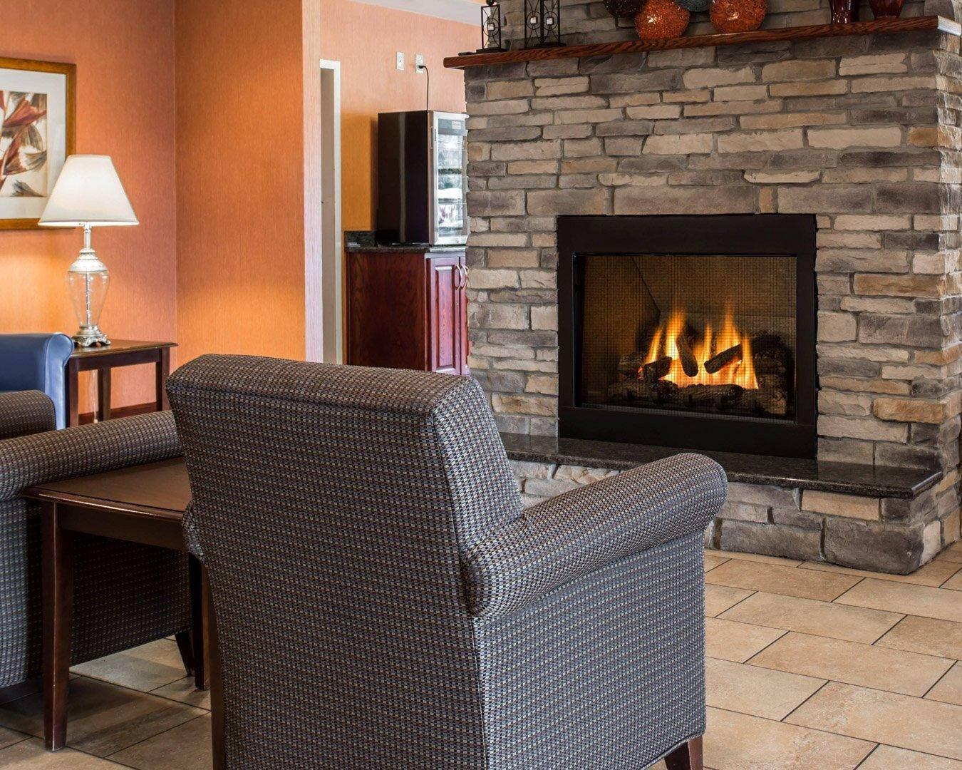 Lobby with fireplace | Comfort Inn & Suites