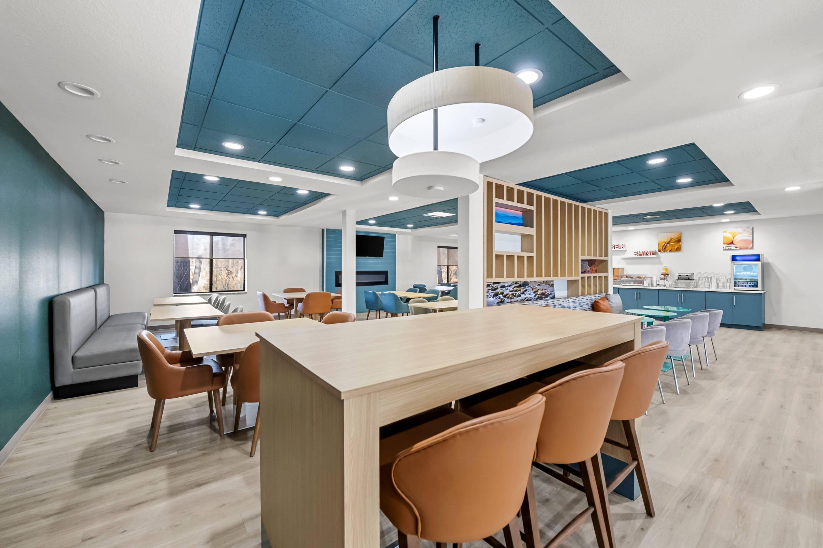 Enjoy breakfast in this seating area | Comfort Suites Sanford