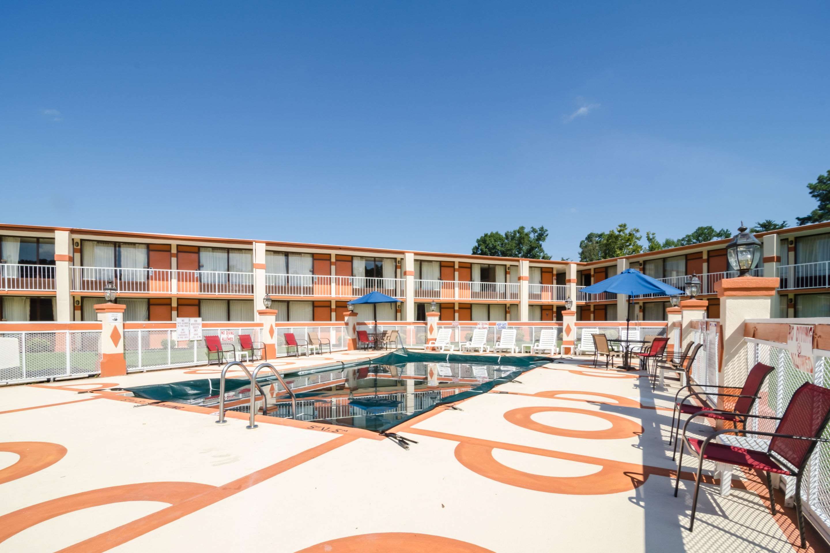 Outdoor pool | Rodeway Inn & Suites Greensboro Southeast