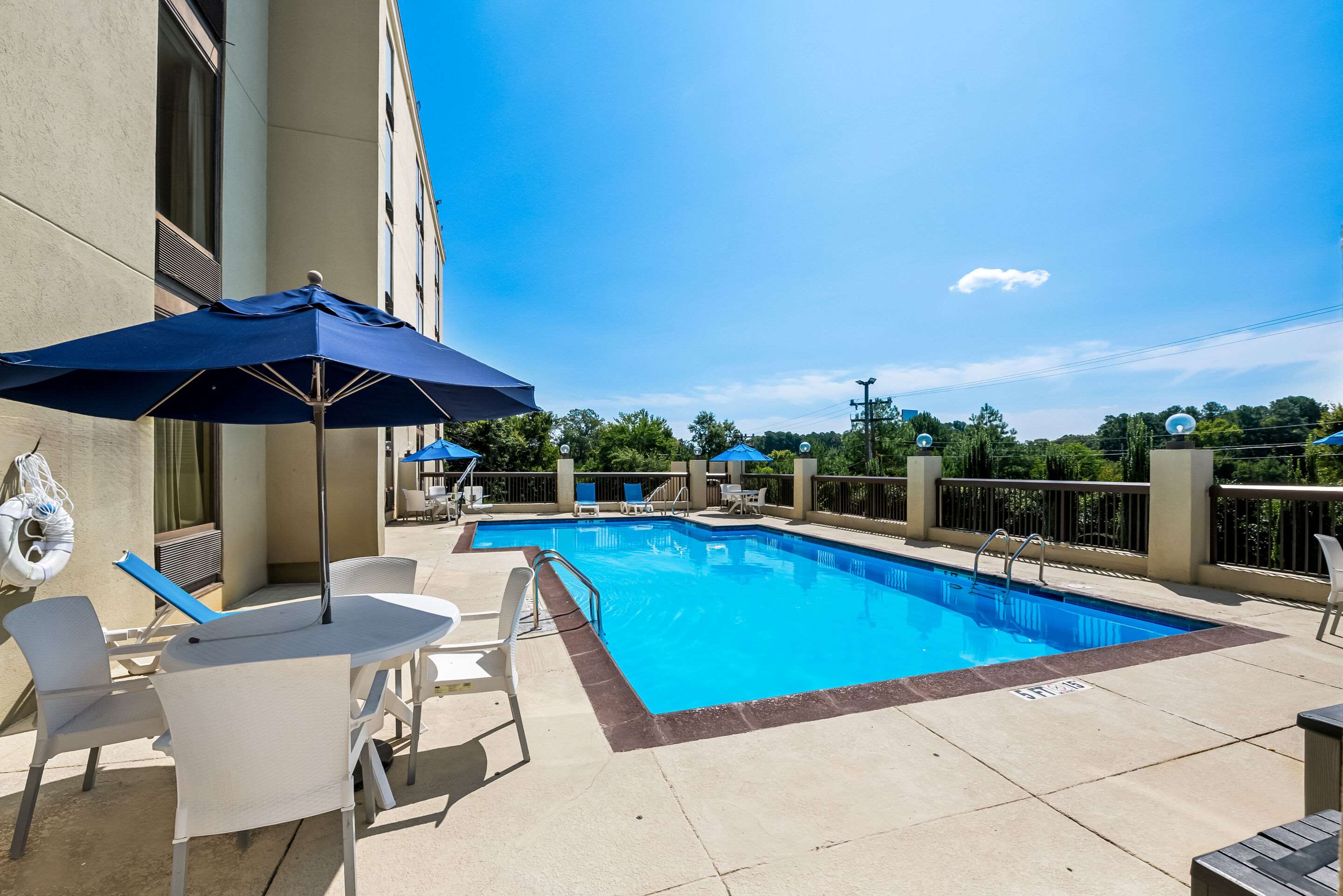 Outdoor pool | Comfort Inn & Suites Durham near Duke University
