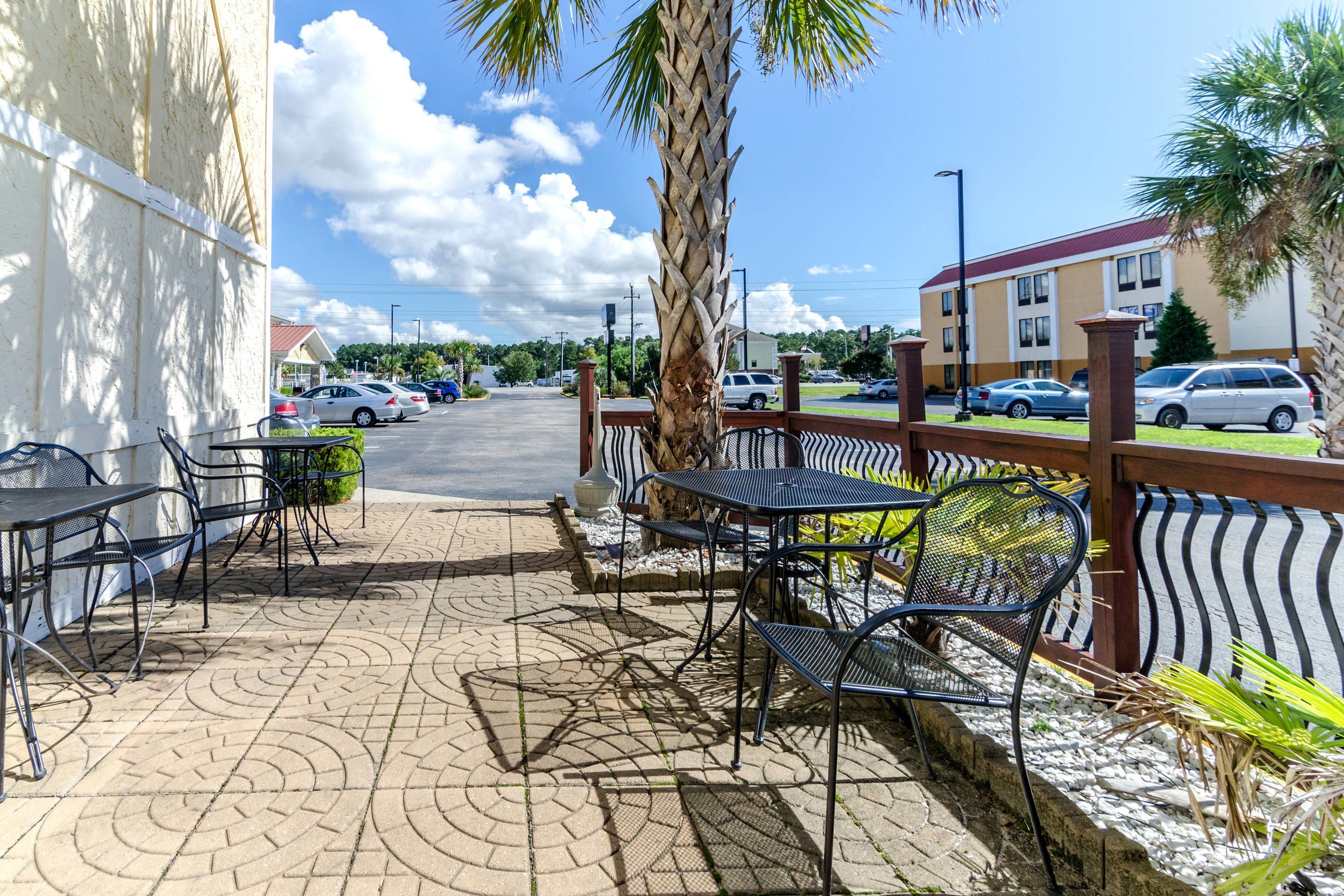 Patio area | Rodeway Inn & Suites Jacksonville near Camp Lejeune