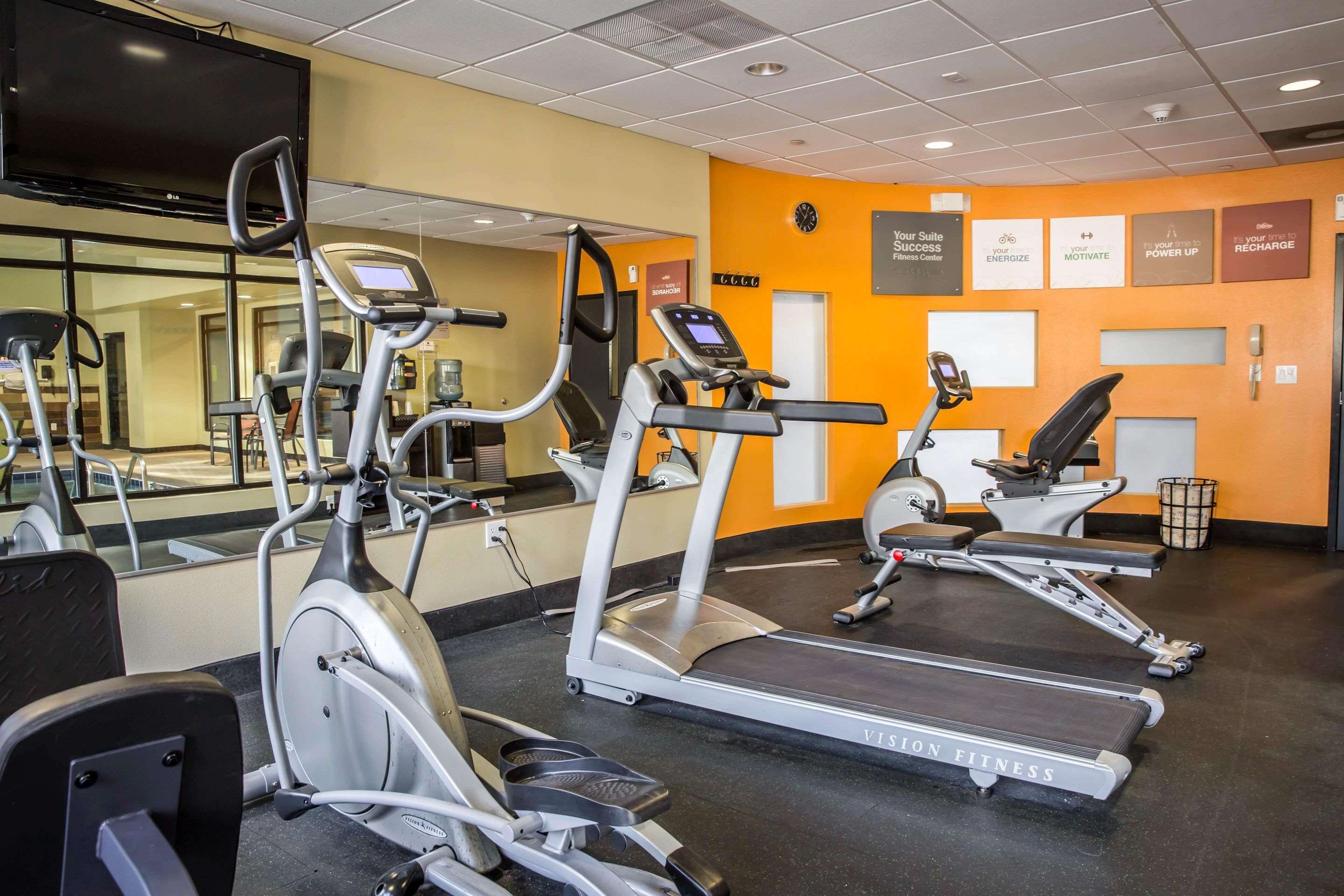 Exercise room with cardio equipment and weights | Comfort Suites New Bern near Cherry Point