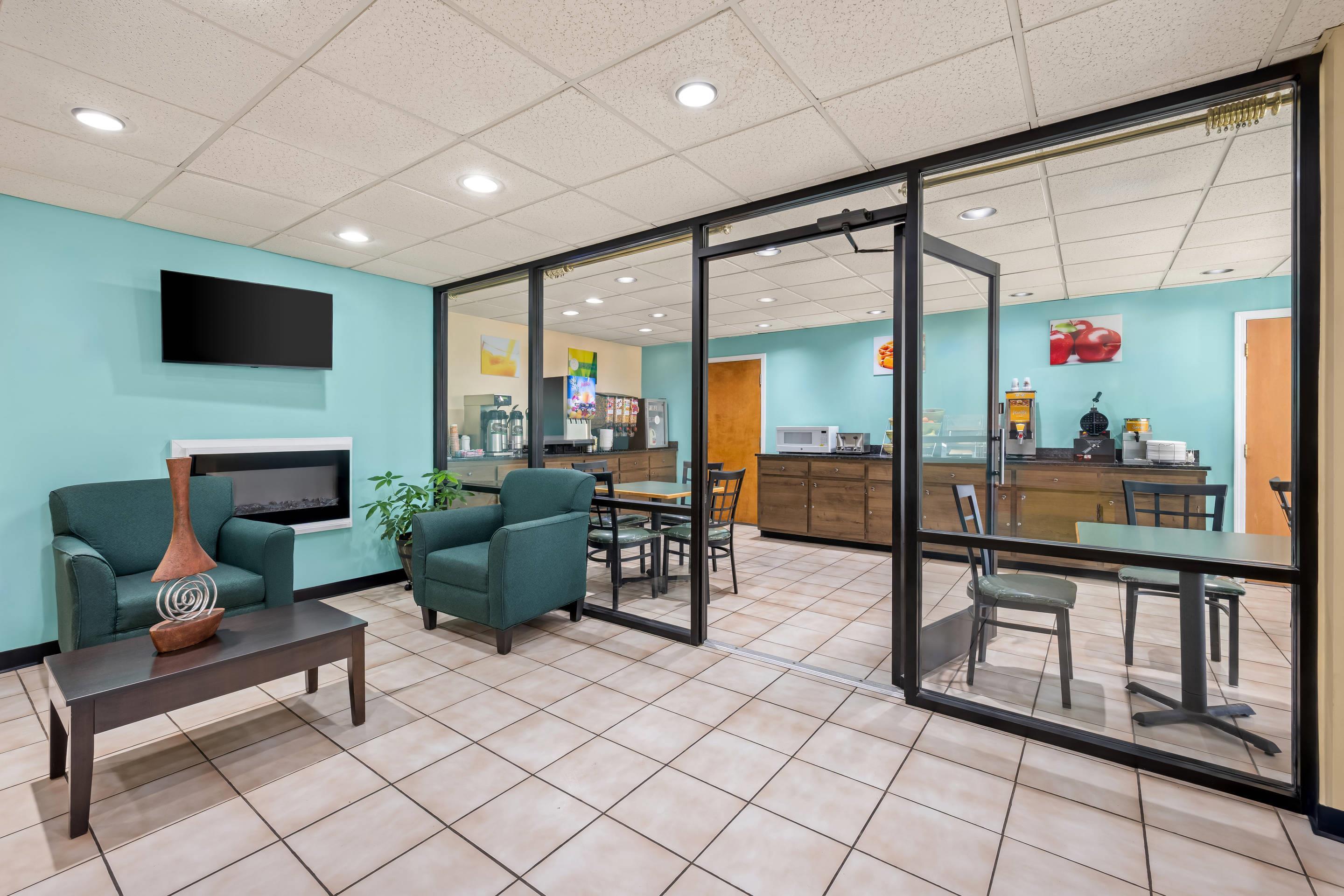 Lobby with sitting area | Quality Inn Henderson I-85