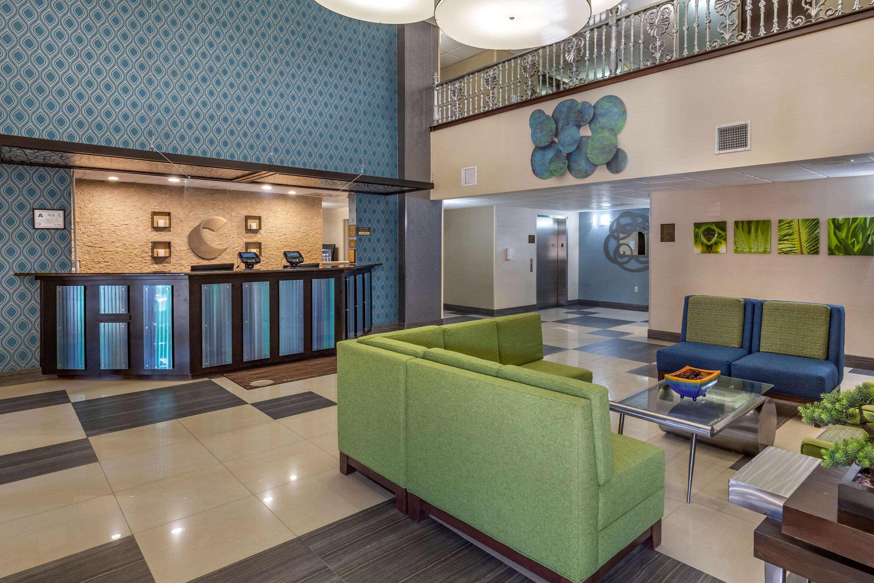 Spacious lobby with sitting area | Comfort Suites Pineville - Ballantyne Area