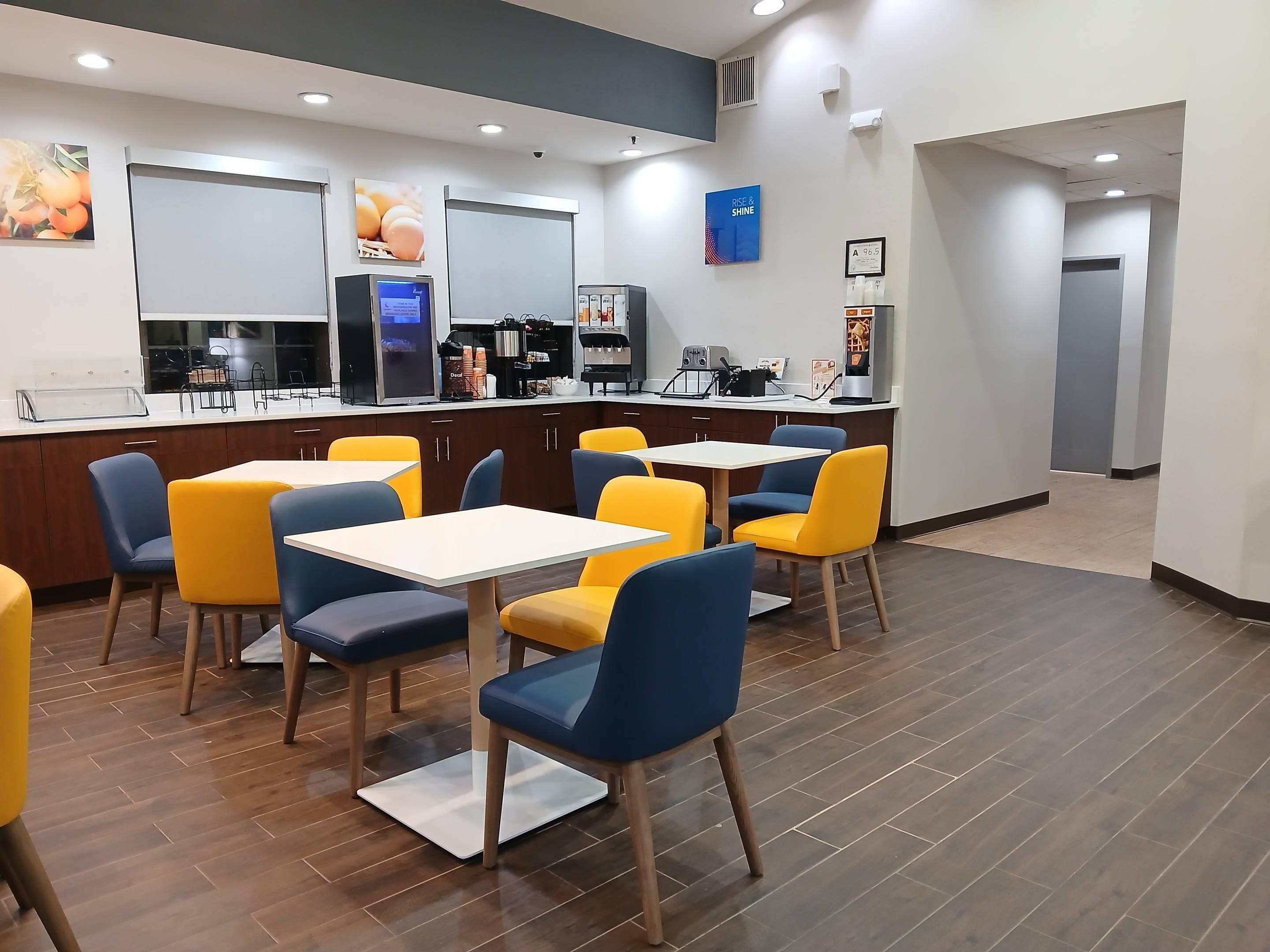 Enjoy breakfast in this seating area | Comfort Inn Marion near Downtown & Blue Ridge PKWY