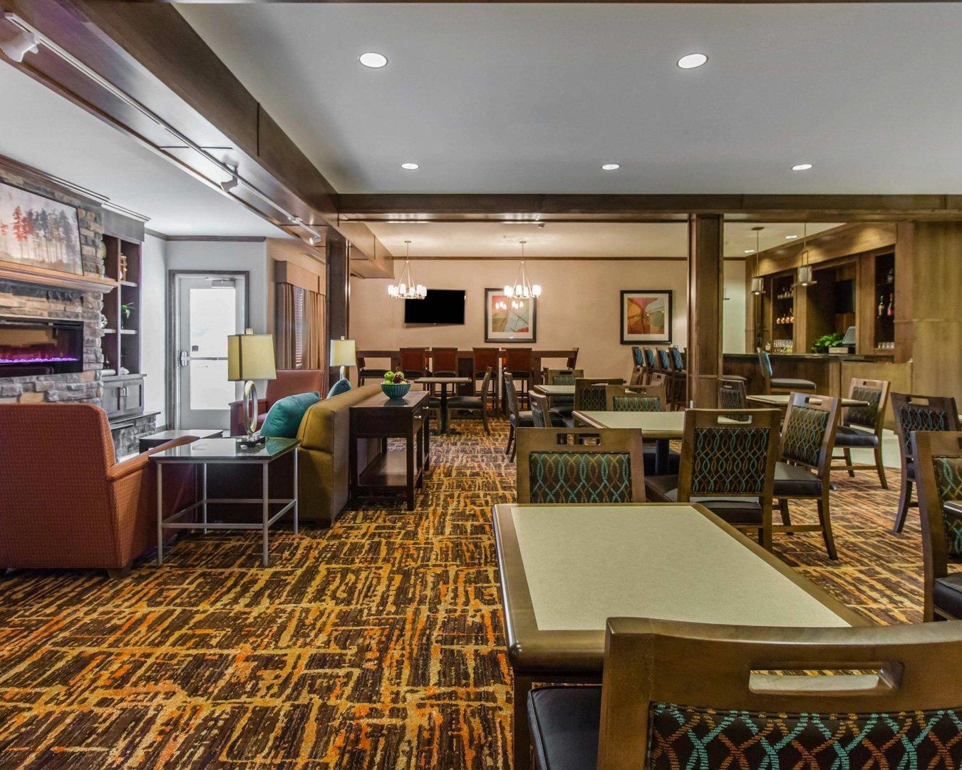 Breakfast area in the lobby | MainStay Suites Watford City - Event Center