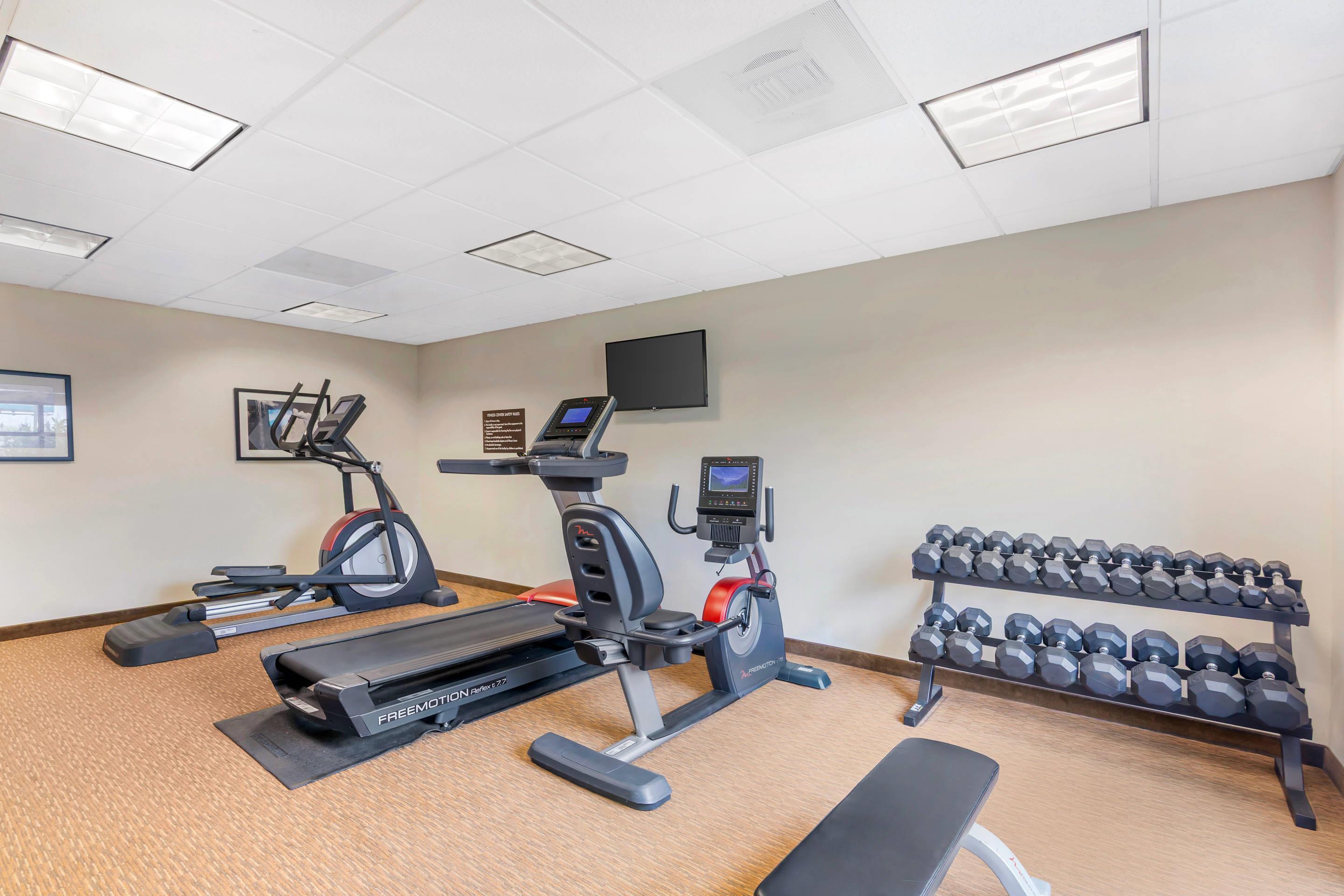 Fitness center with television | Sleep Inn & Suites Devils Lake