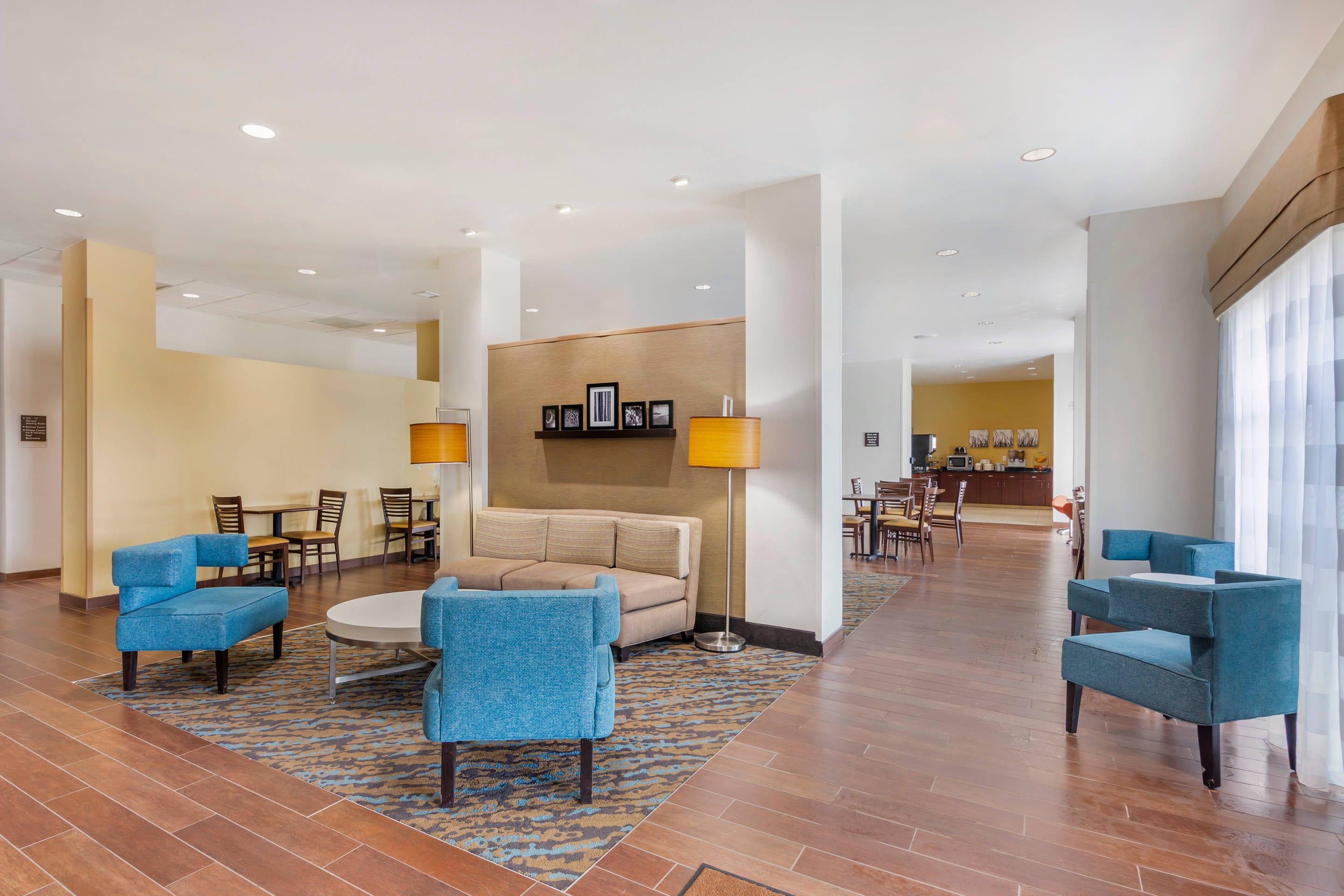 Lobby with sitting area | Sleep Inn & Suites Devils Lake