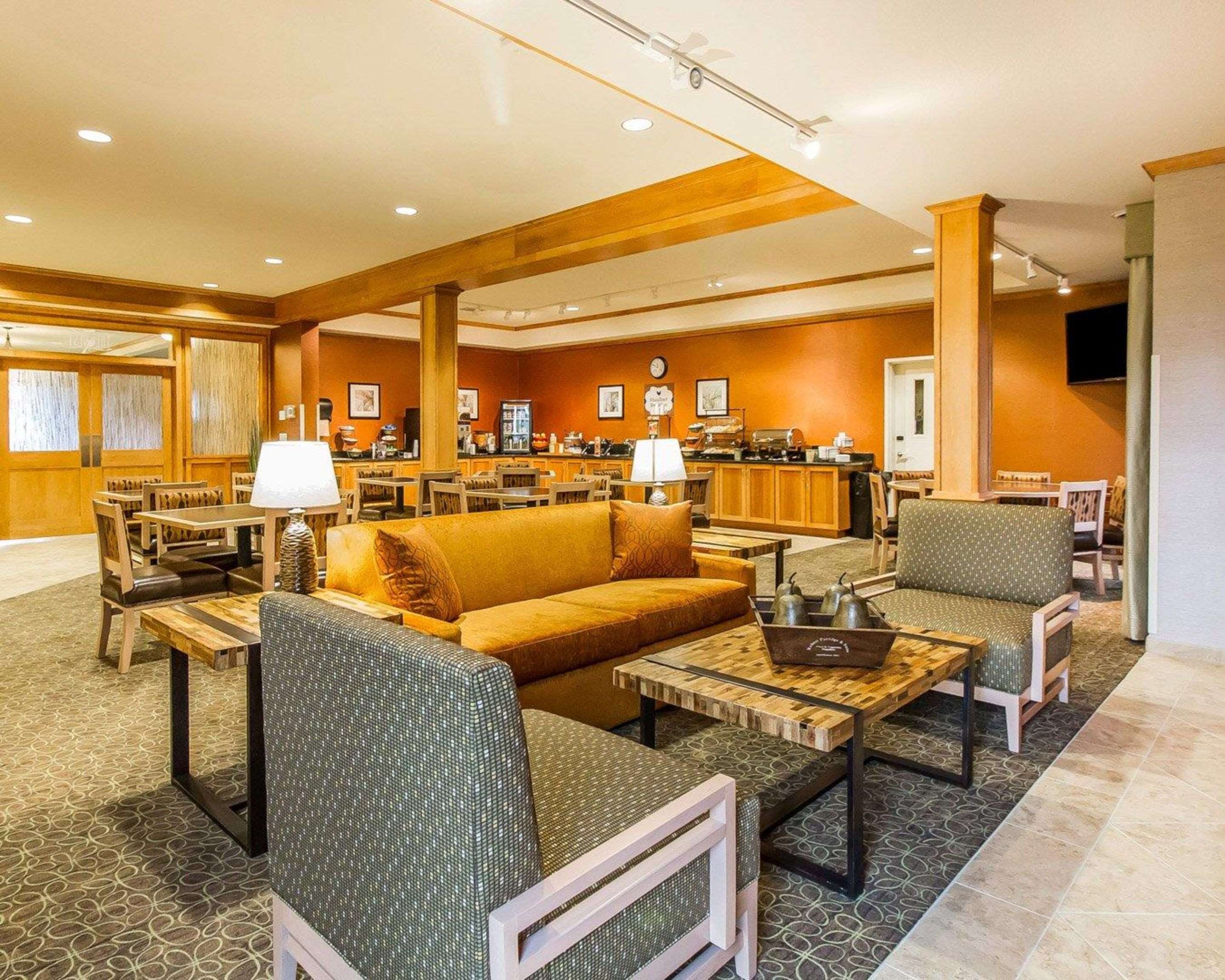 Enjoy breakfast in this seating area | MainStay Suites Stanley