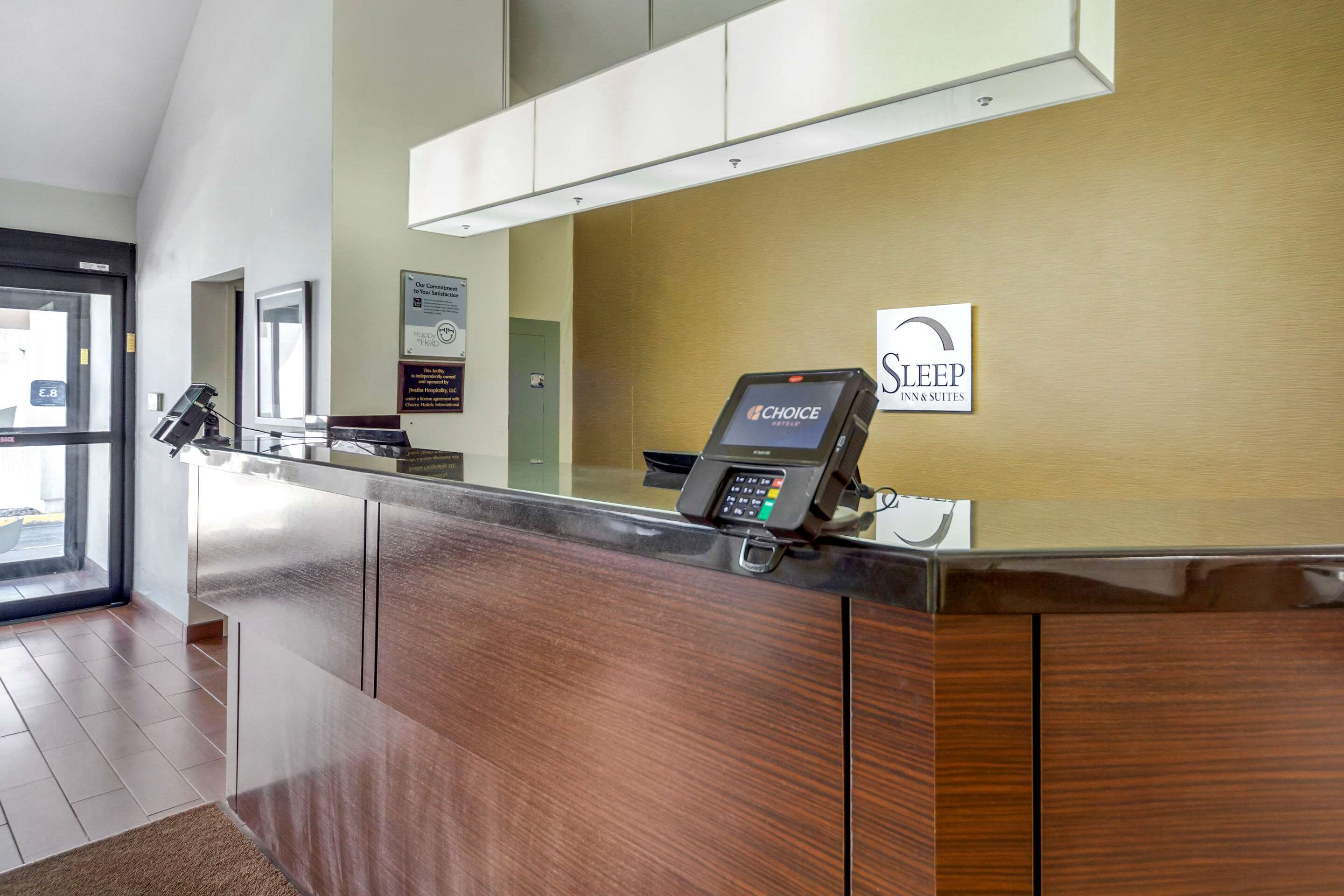 Front desk | Sleep Inn & Suites Omaha Airport