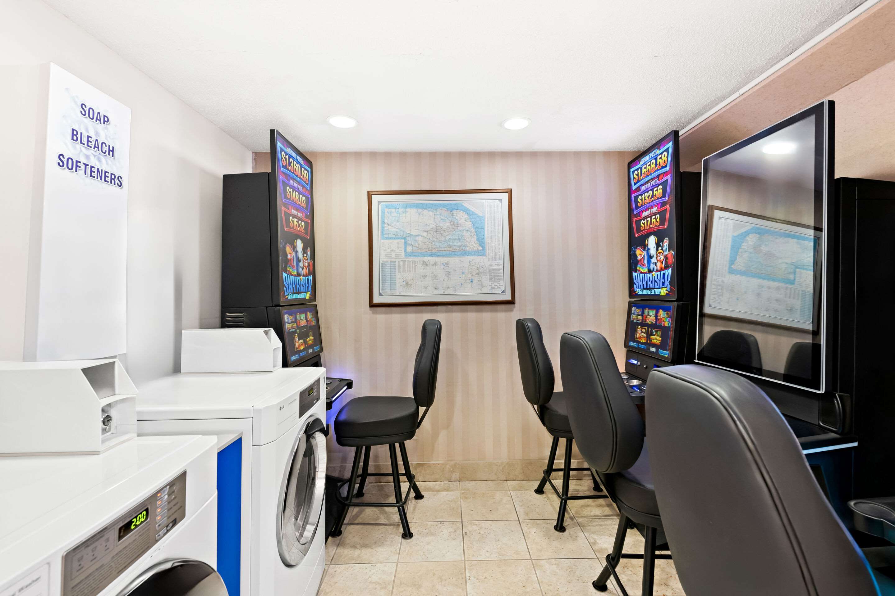 Laundry Area with Arcade Games | Quality Inn