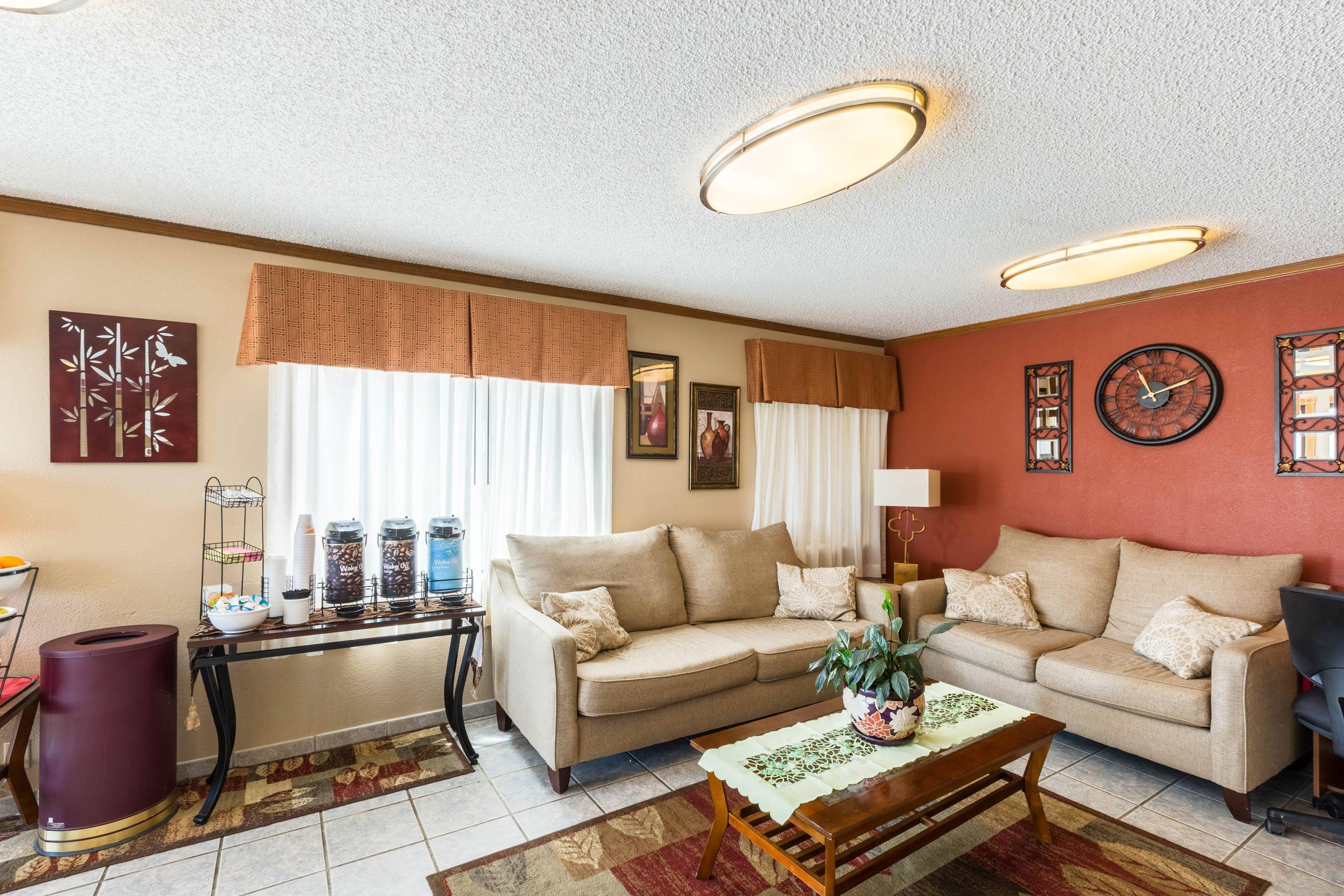 Lobby with sitting area | Quality Inn