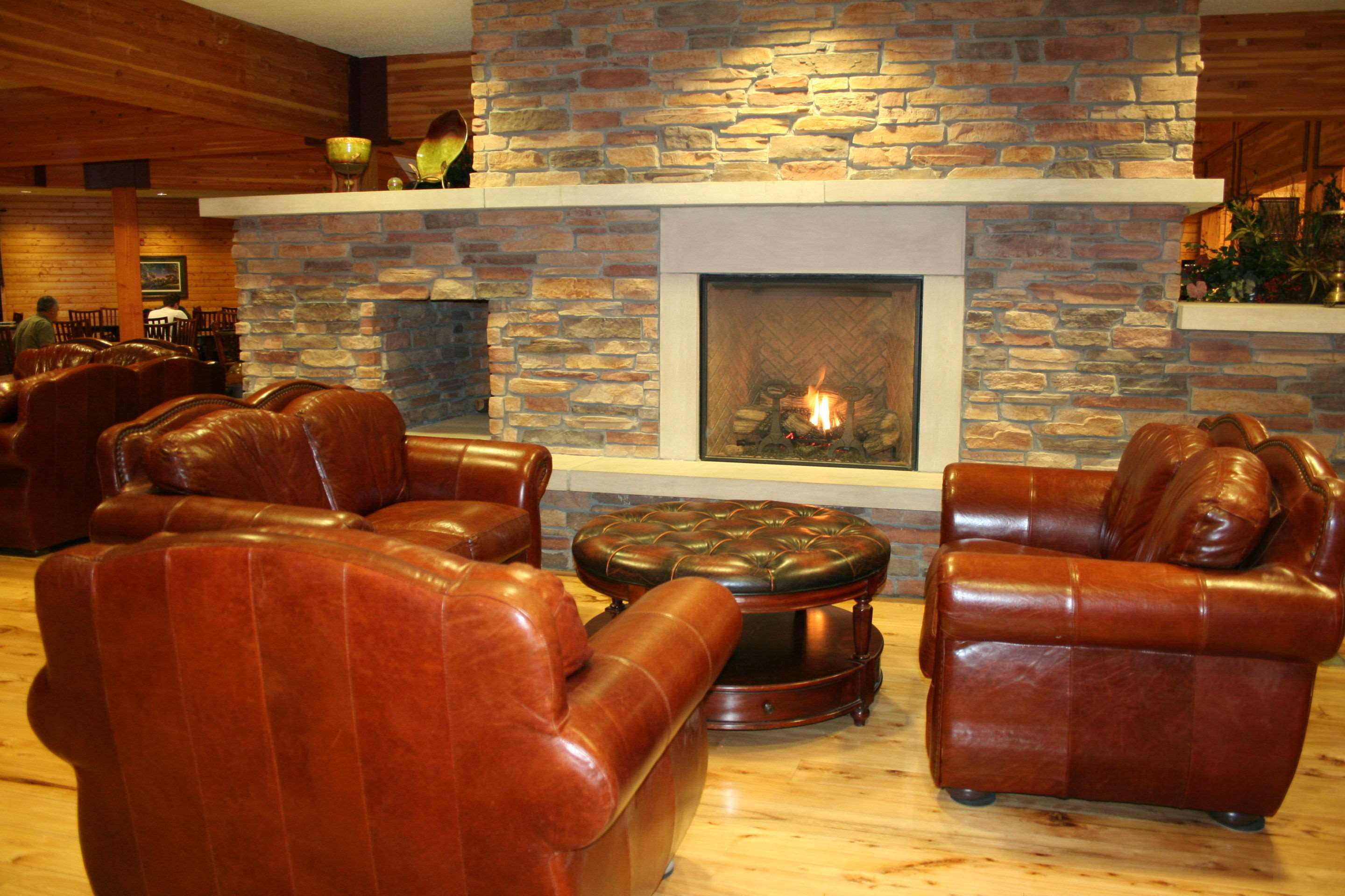 Relax by the fireplace in the lobby