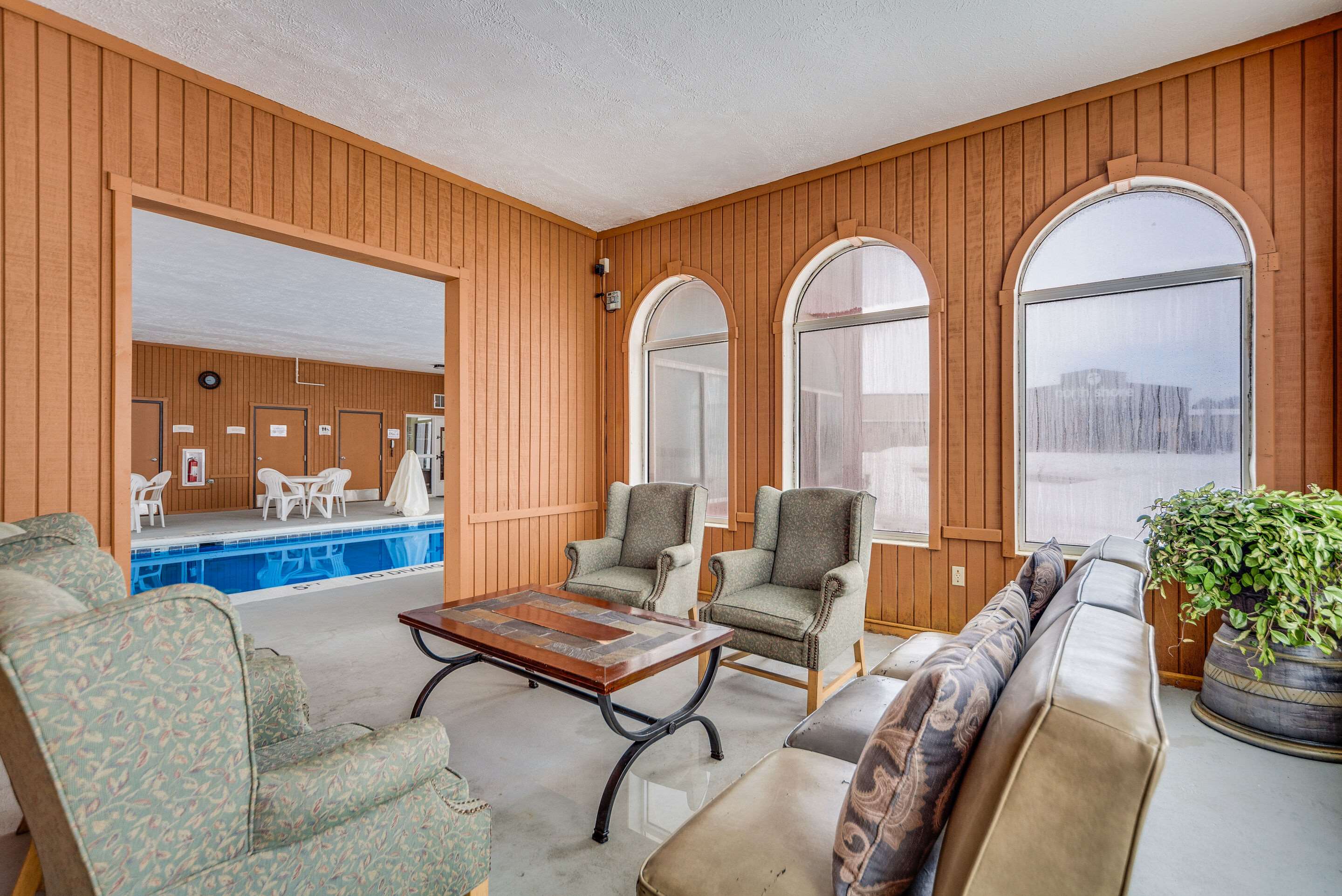Pool area | Quality Inn