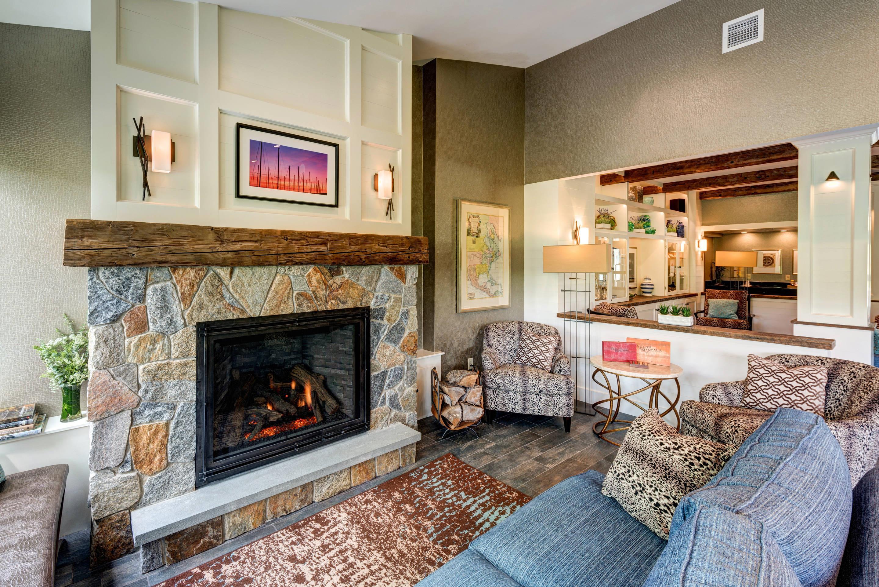 Spacious lobby with sitting area | The Garrison Hotel & Suites Dover - Durham, Ascend Hotel Collection