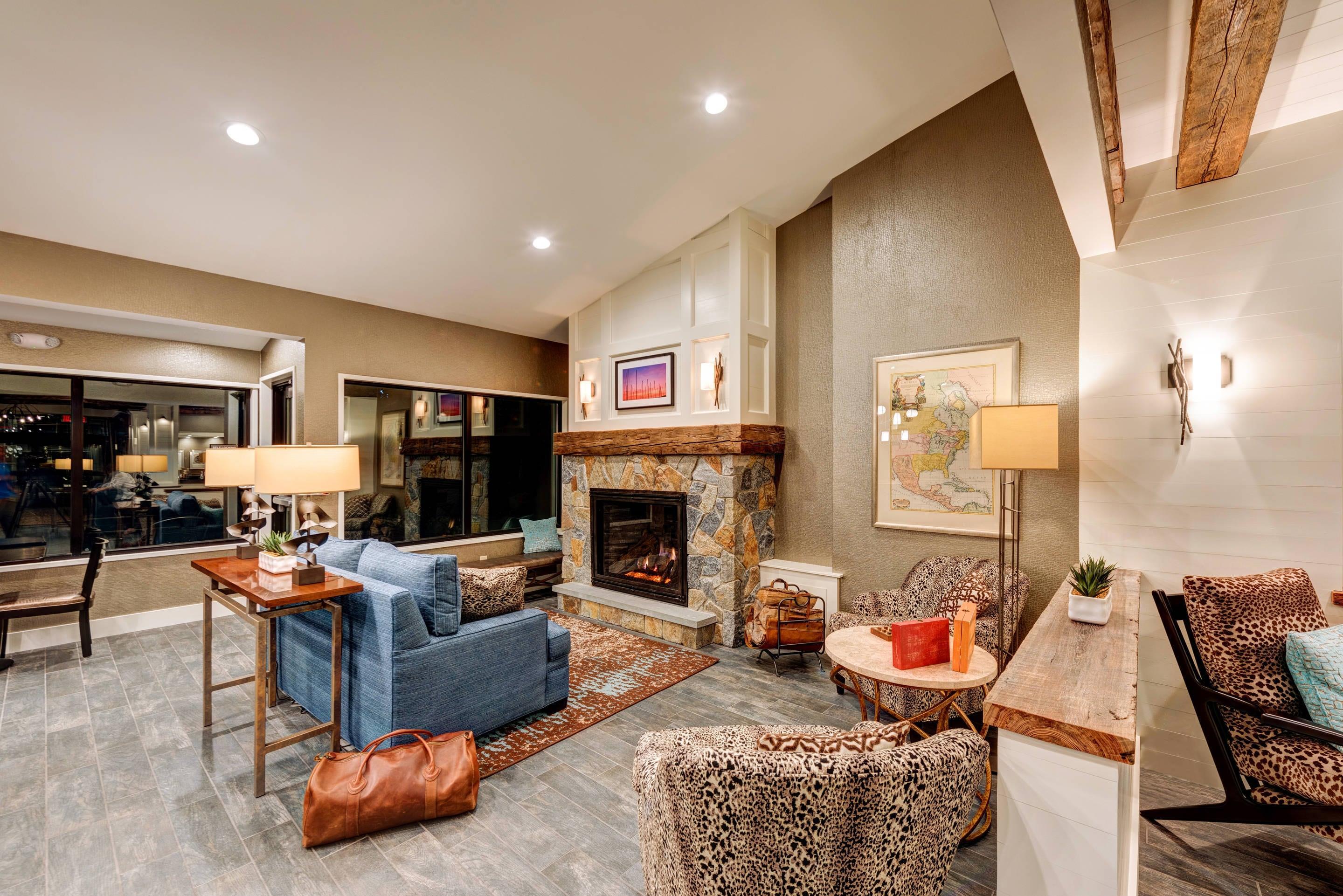 Spacious lobby with sitting area | The Garrison Hotel & Suites Dover - Durham, Ascend Hotel Collection