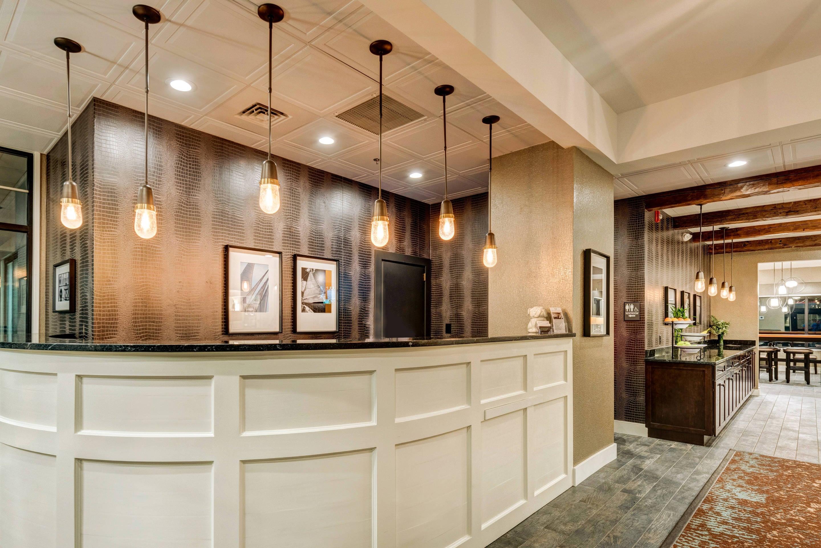 Front desk with friendly staff | The Garrison Hotel & Suites Dover - Durham, Ascend Hotel Collection