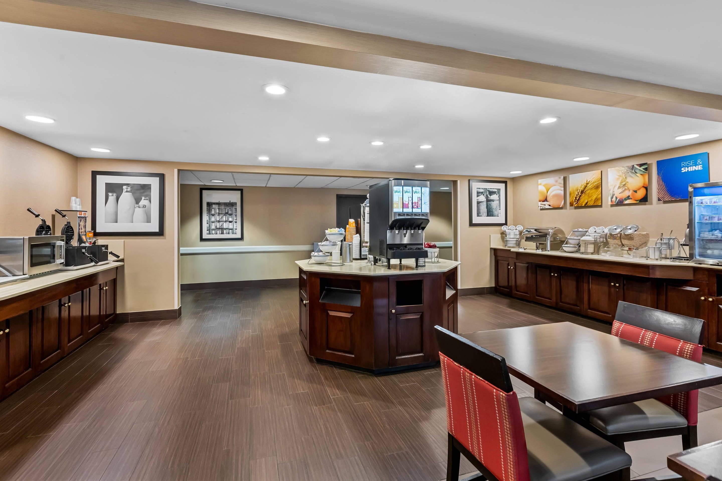 Enjoy breakfast in this seating area | Comfort Inn & Suites Somerset - New Brunswick