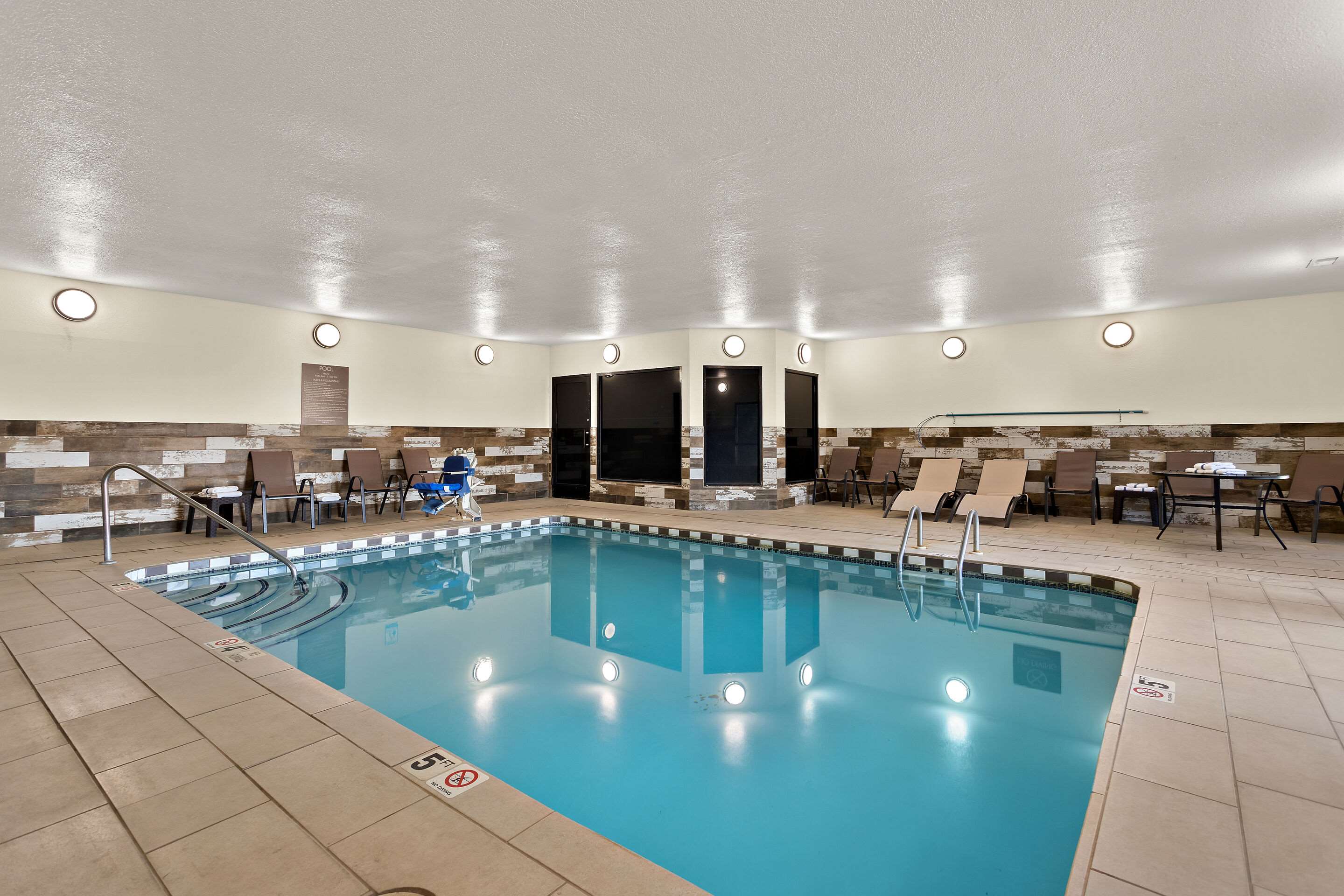 Relax by the pool | Comfort Suites University Las Cruces