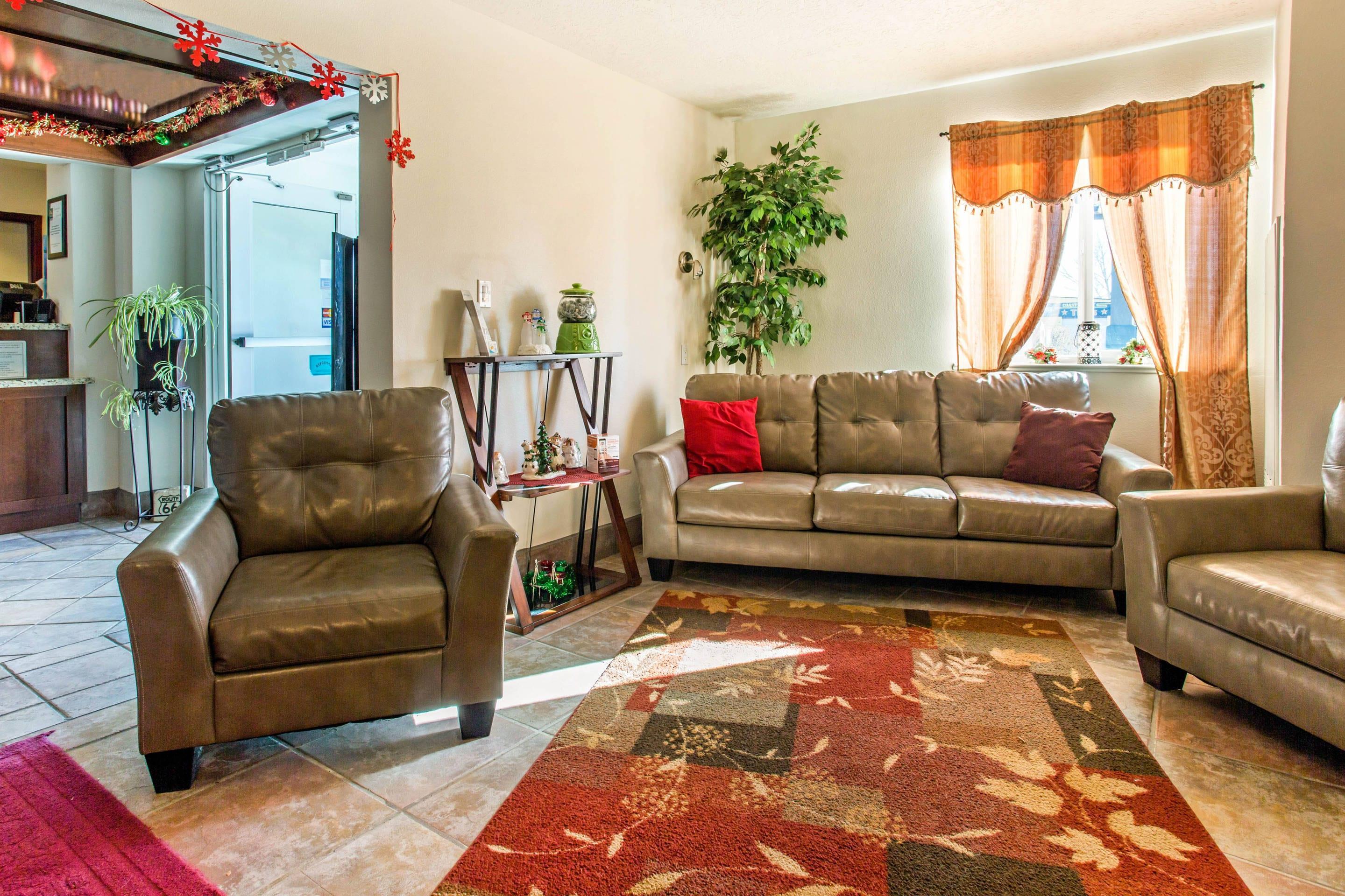 Lobby with sitting area | Quality Inn