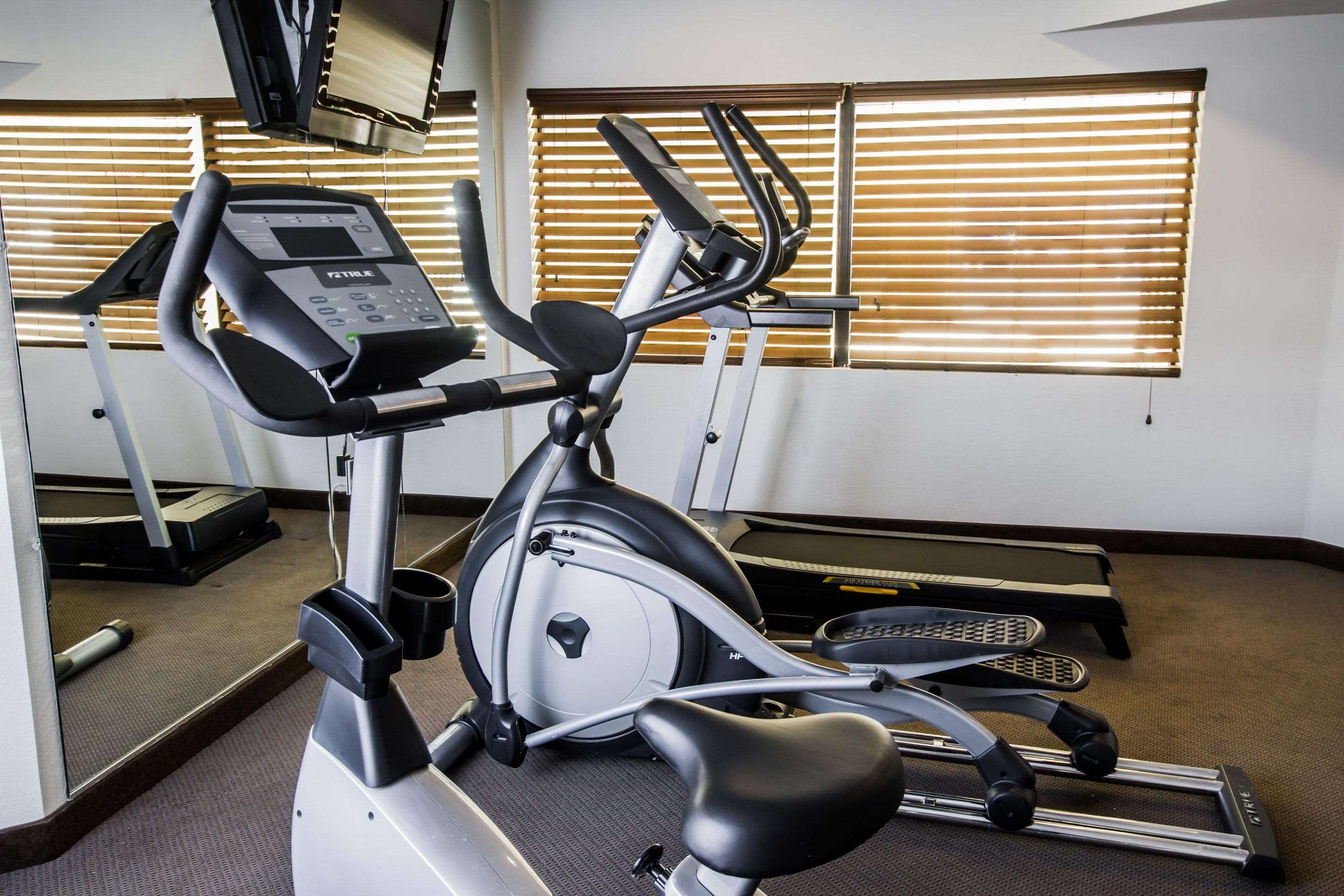 Exercise room with cardio equipment | Sleep Inn Gallup