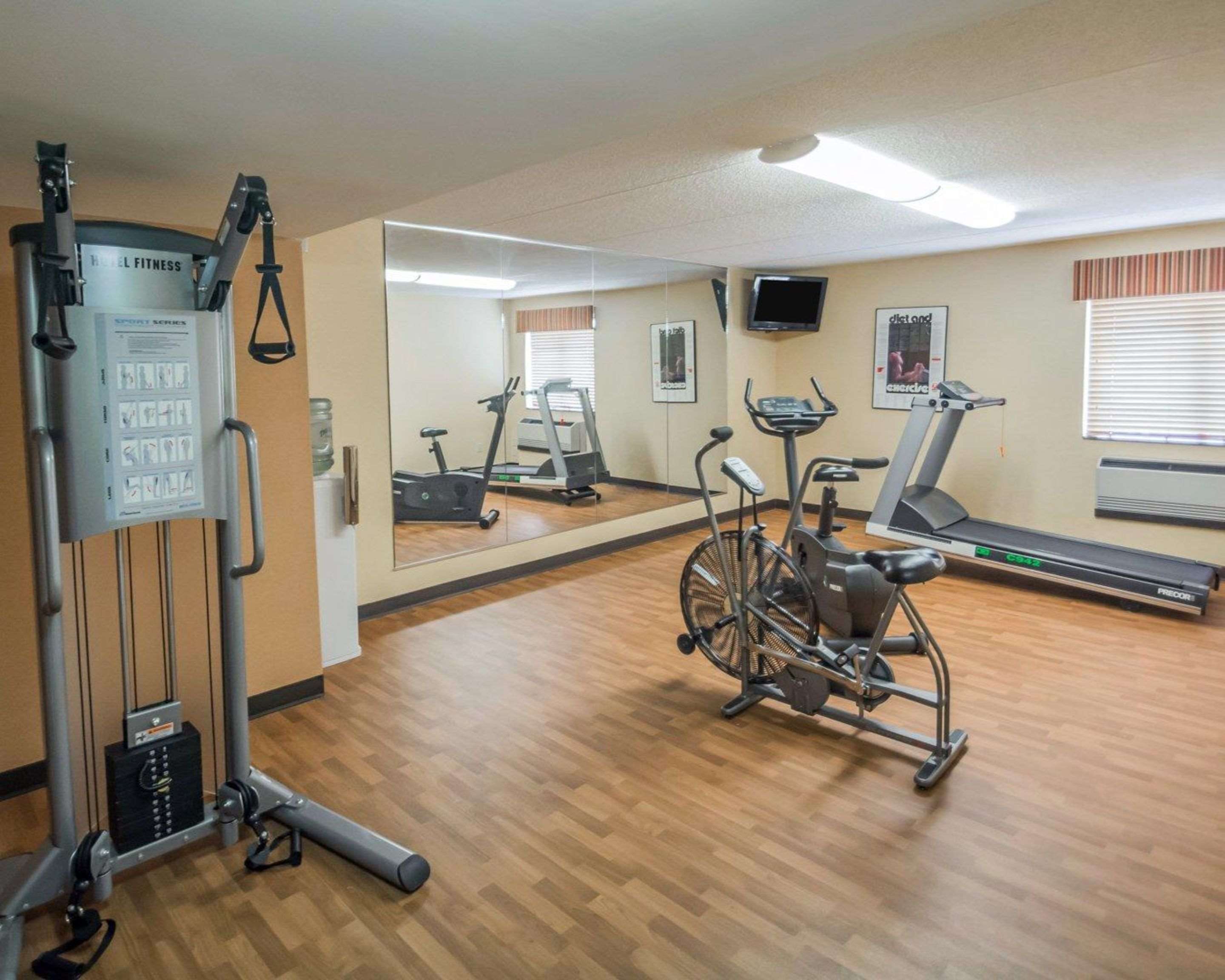 Fitness center with cardio equipment and weights