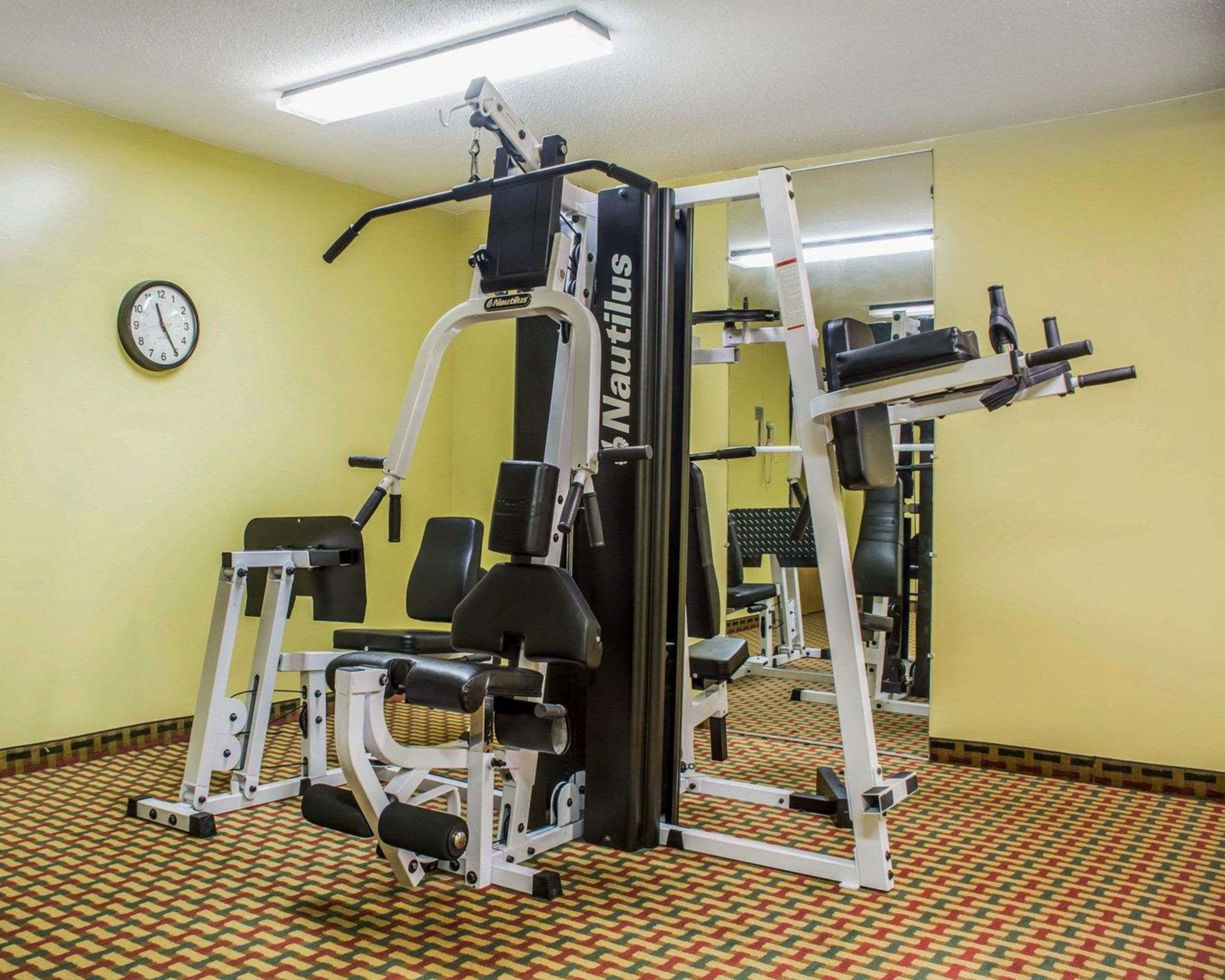 Fitness center with cardio equipment and weights