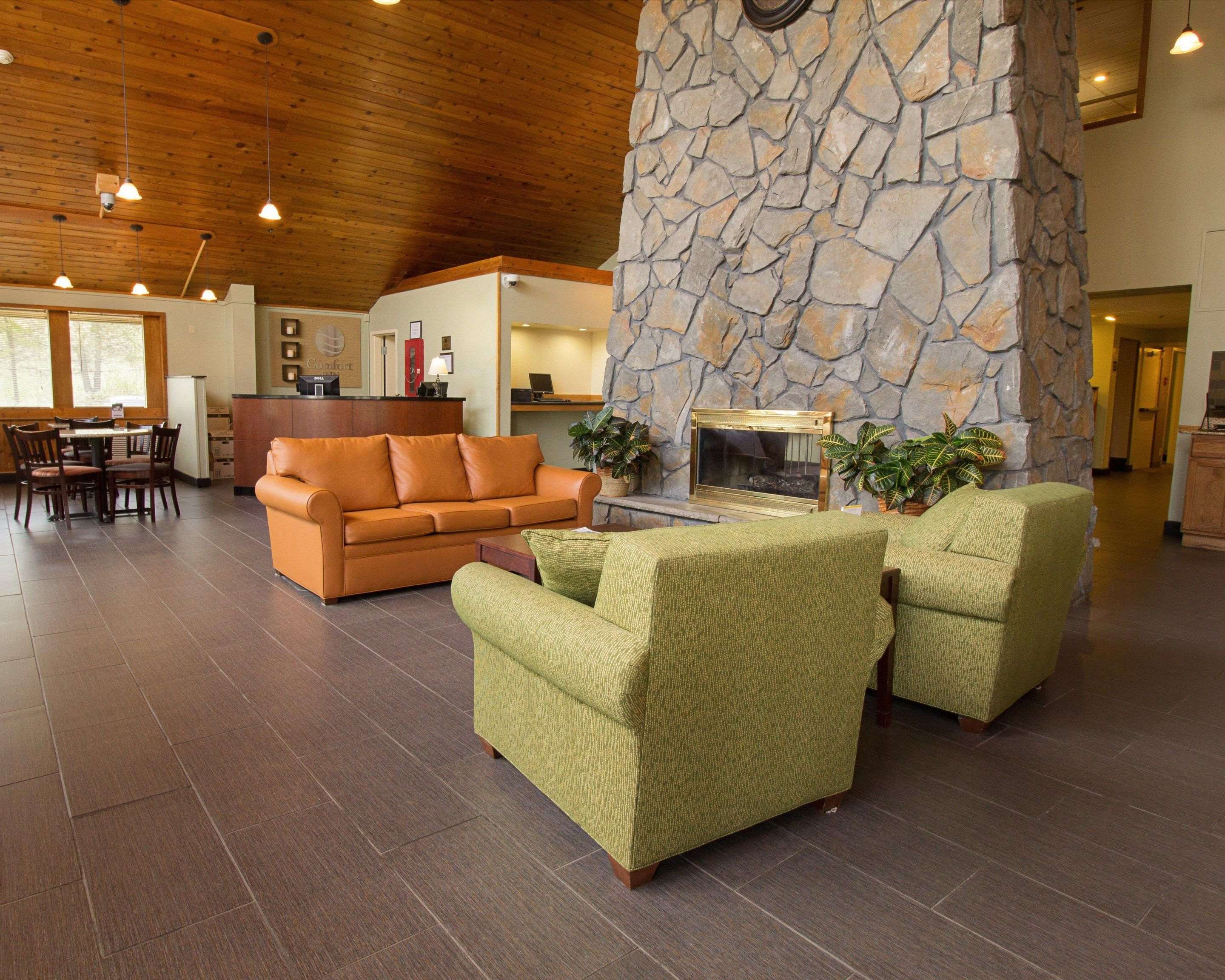 Spacious lobby with sitting area | Comfort Inn & Suites Syracuse-Carrier Circle