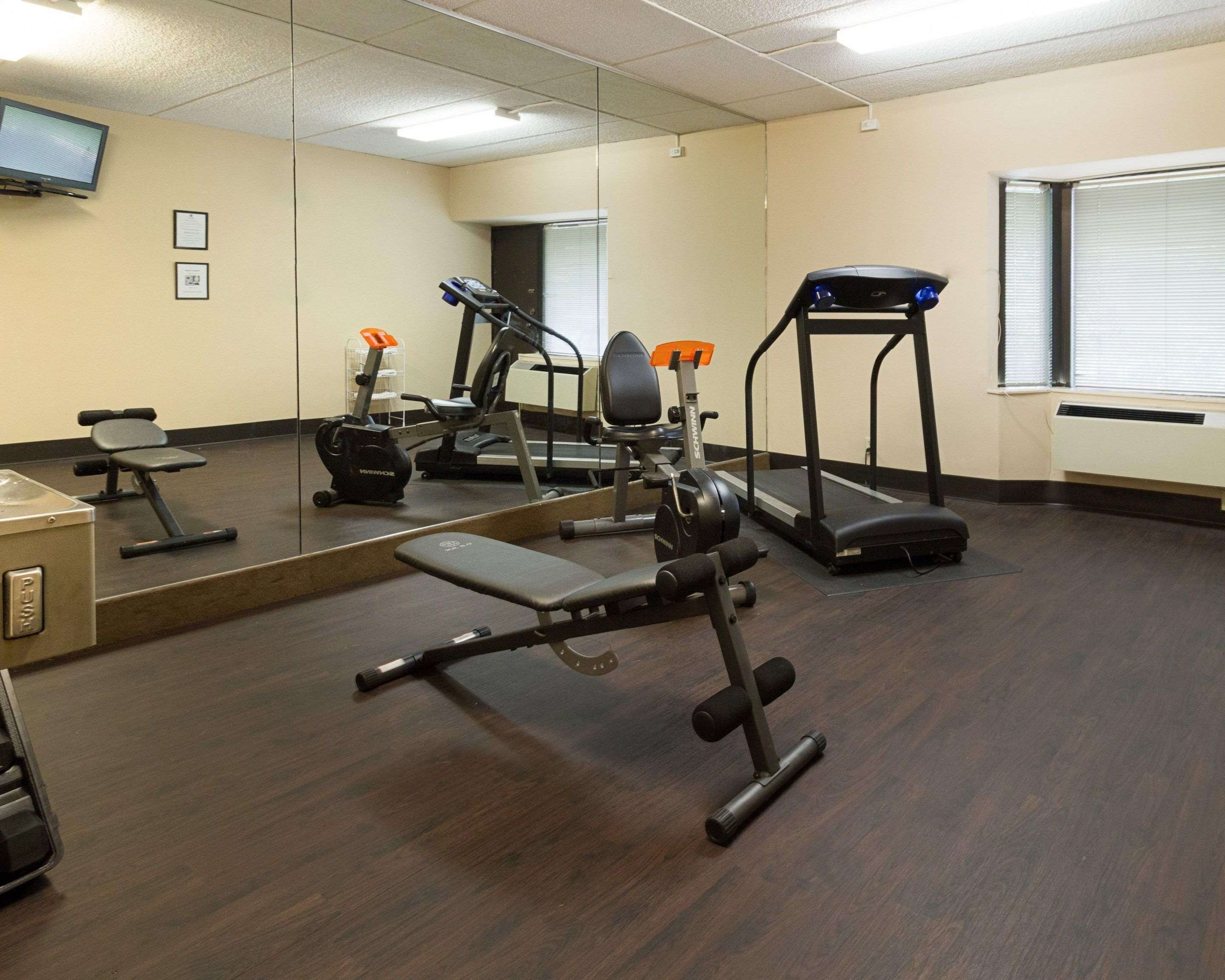 Fitness center with cardio equipment and weights | Comfort Inn & Suites Syracuse-Carrier Circle