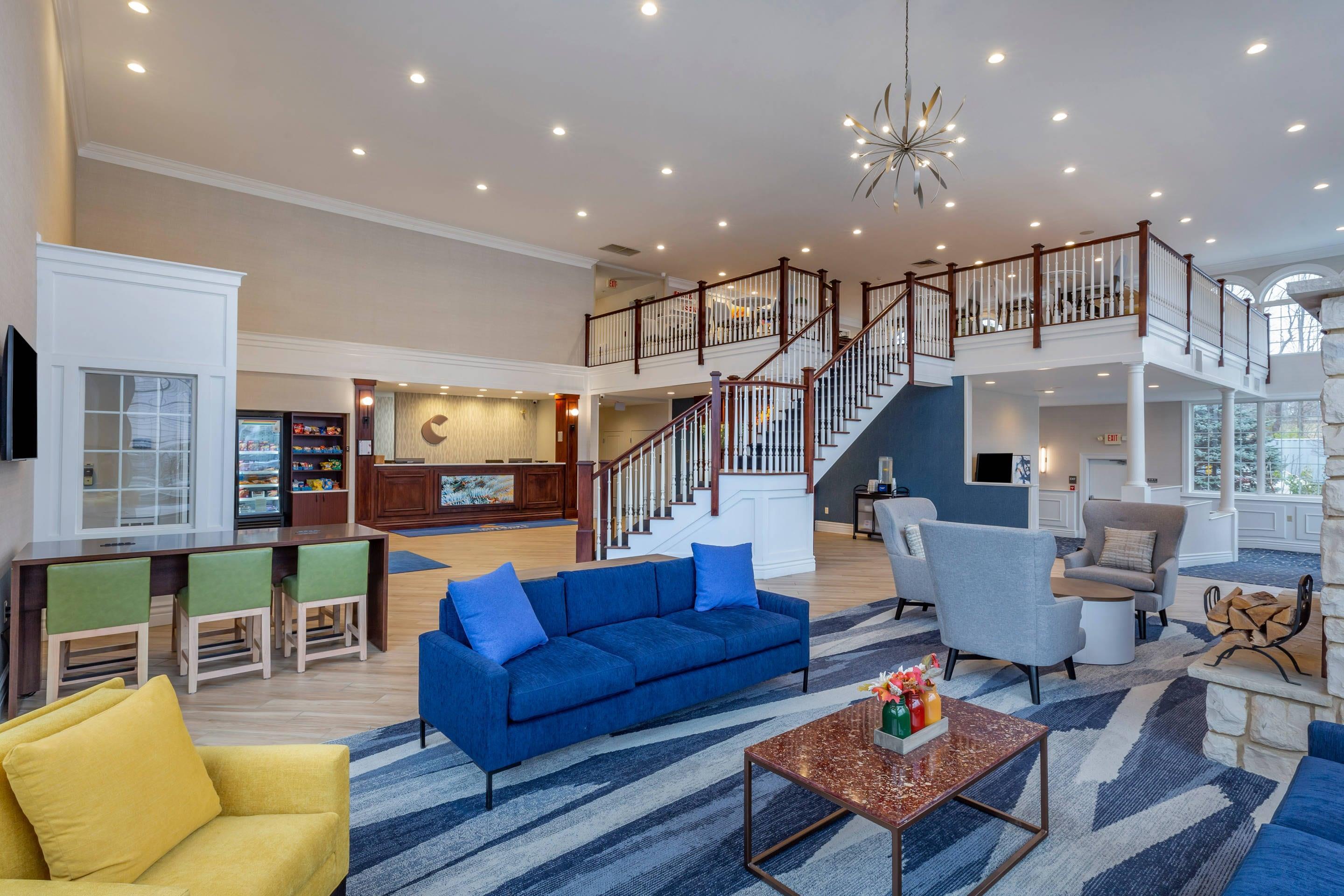 Spacious lobby with sitting area | Comfort Inn & Suites East Greenbush - Albany