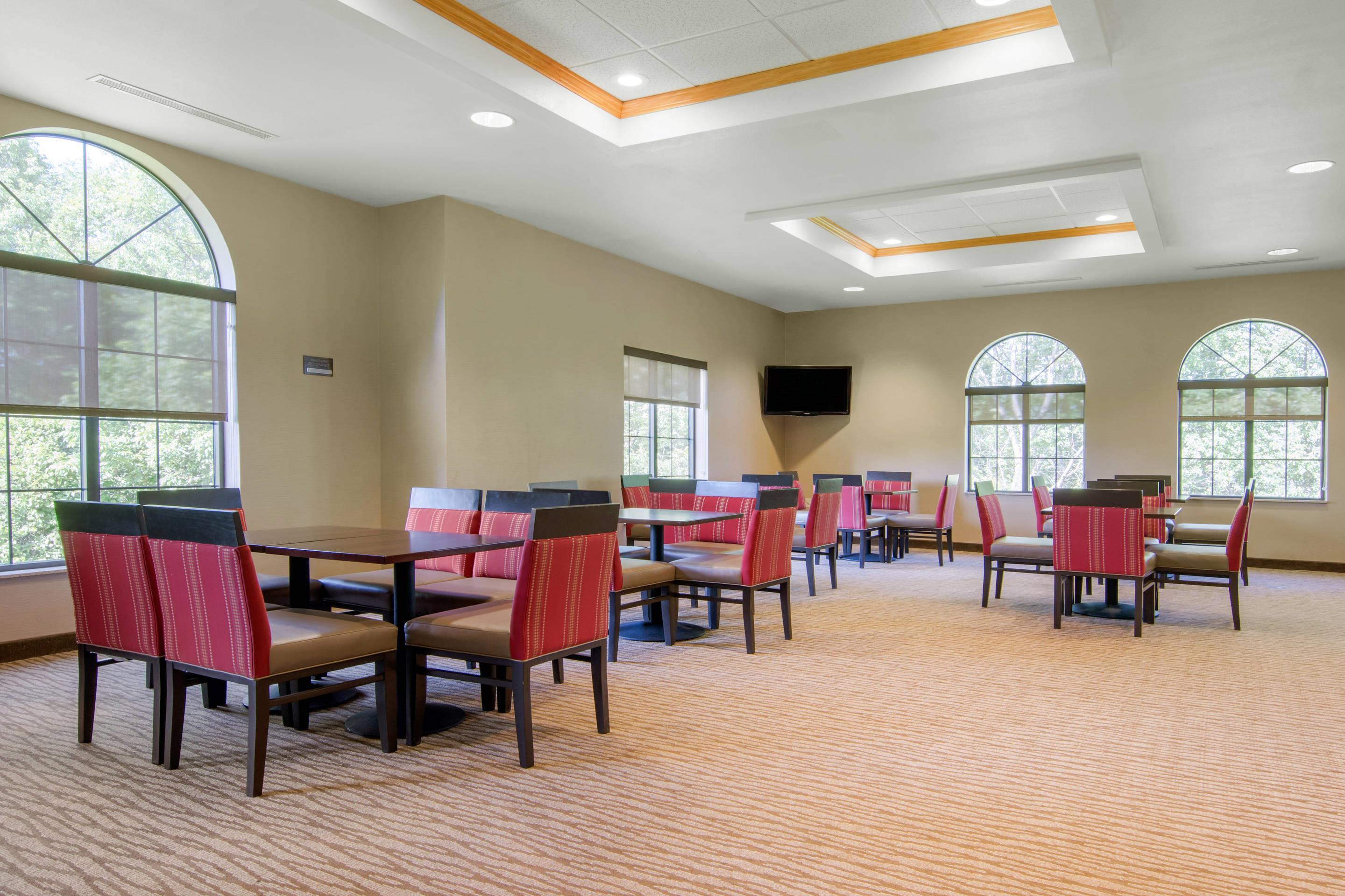 Enjoy breakfast in this seating area | Comfort Inn & Suites Milford/Cooperstown