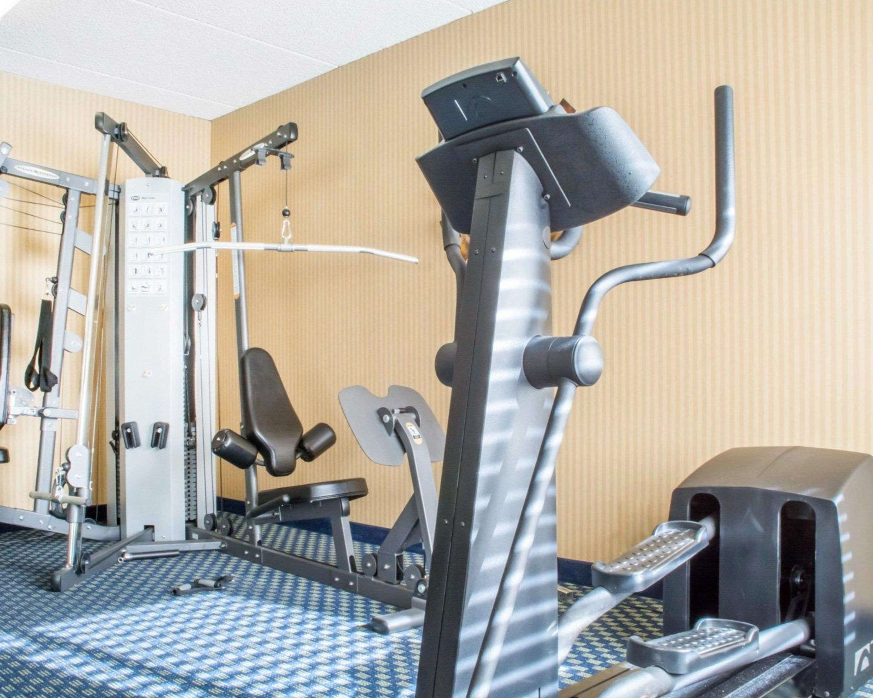 Fitness center with cardio equipment and weights | Comfort Inn Rochester - Greece