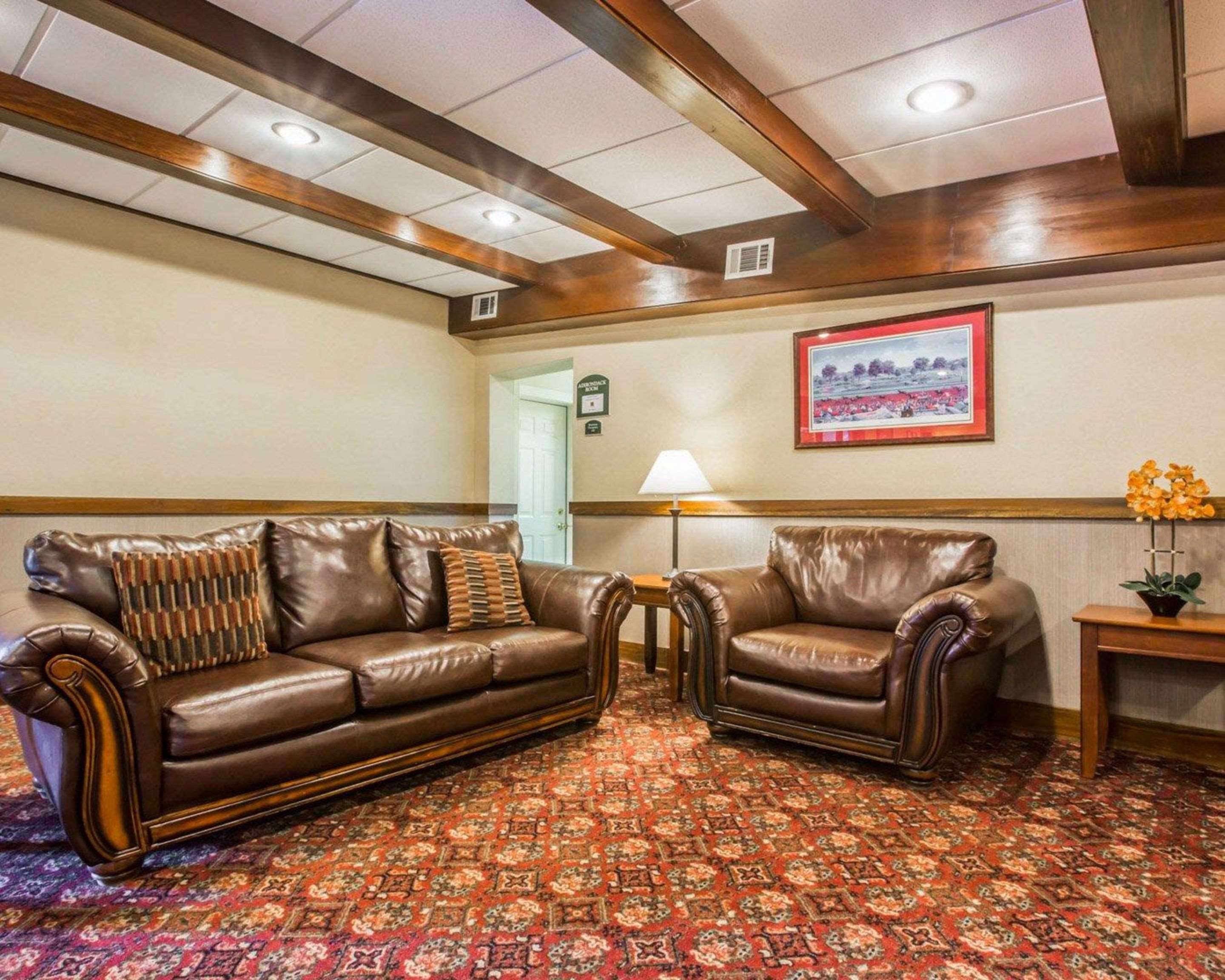 Lobby with sitting area | Clarion Inn & Suites at the Outlets of Lake George