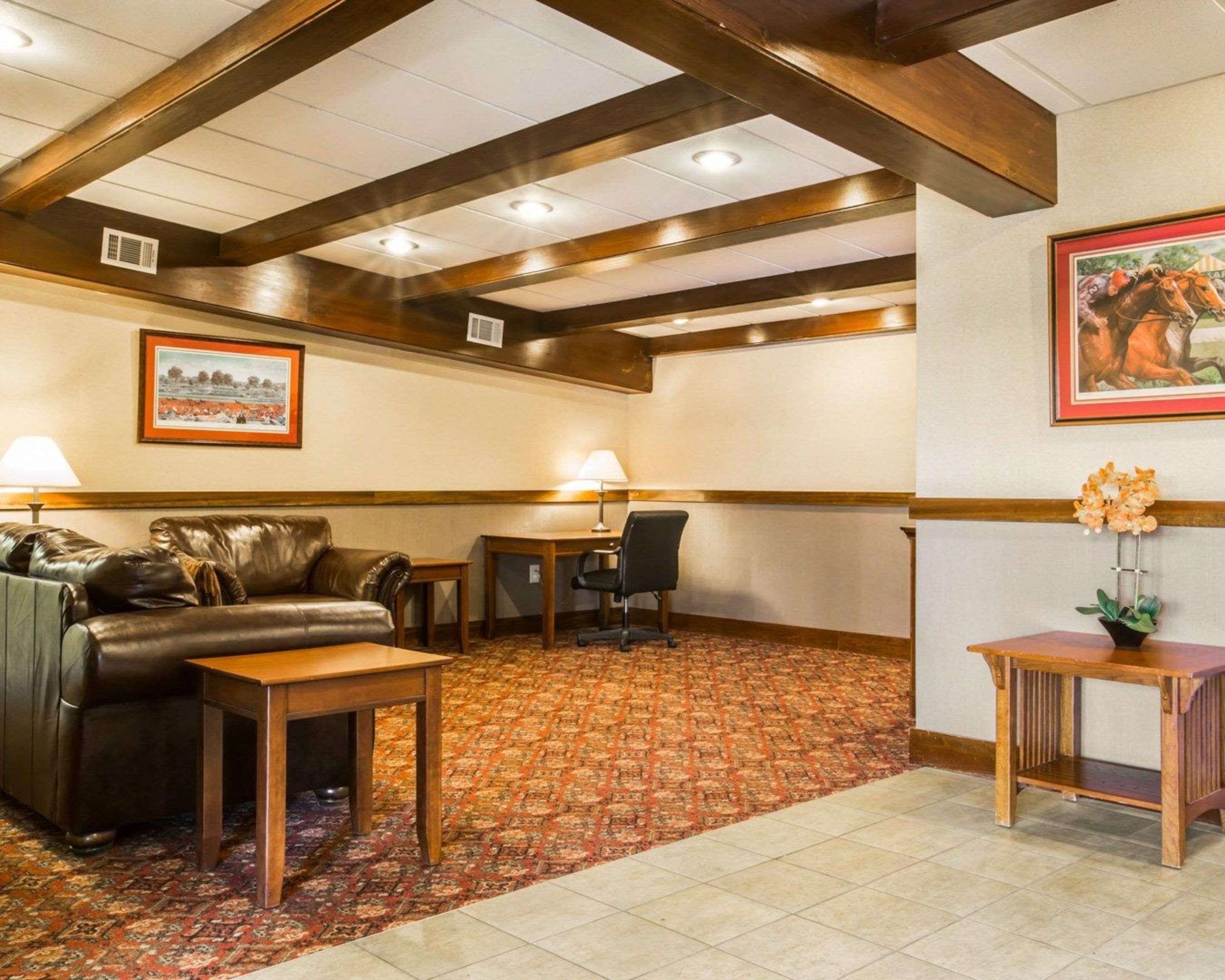 Spacious lobby with sitting area | Clarion Inn & Suites at the Outlets of Lake George