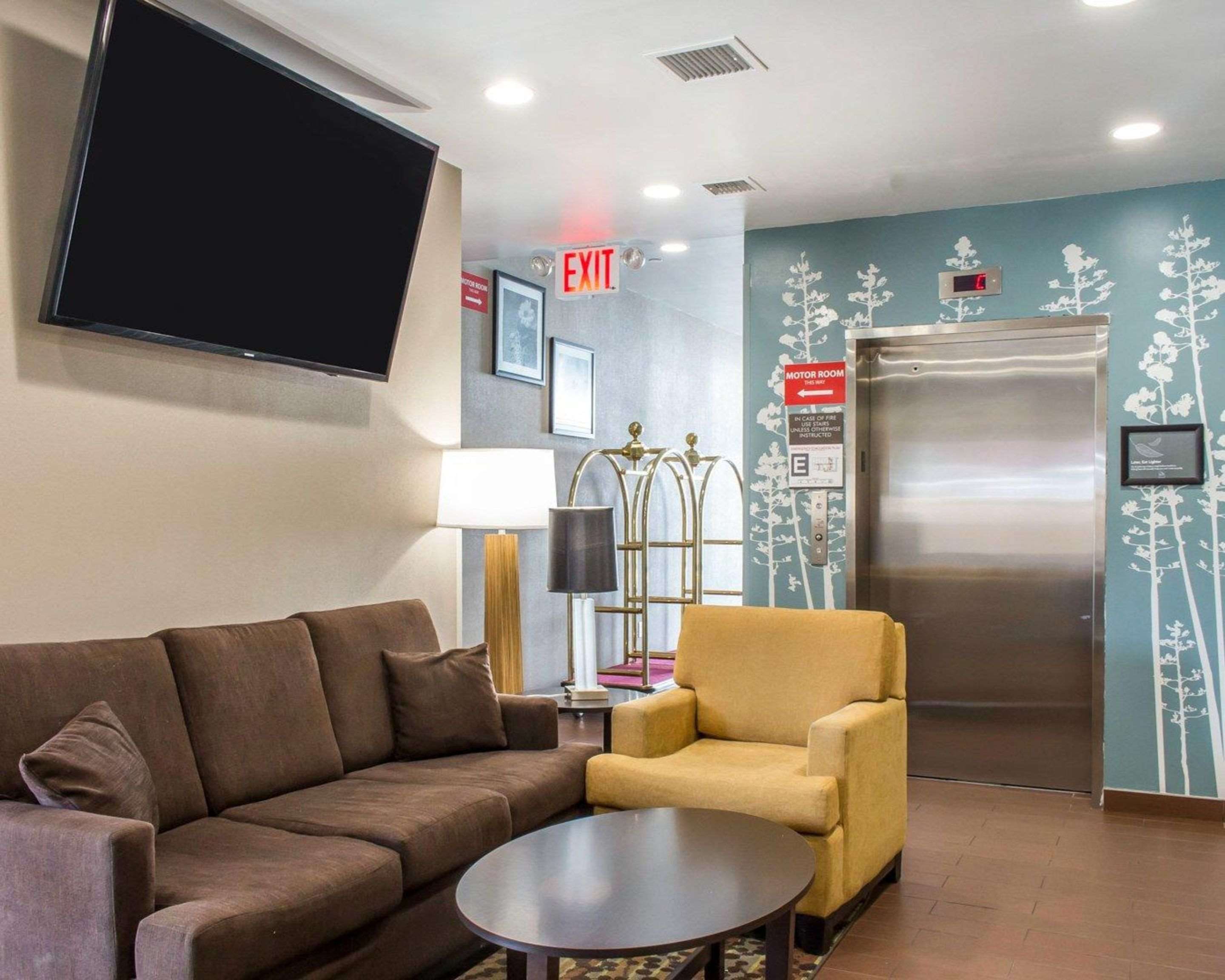 Spacious lobby with sitting area | Sleep Inn Coney Island
