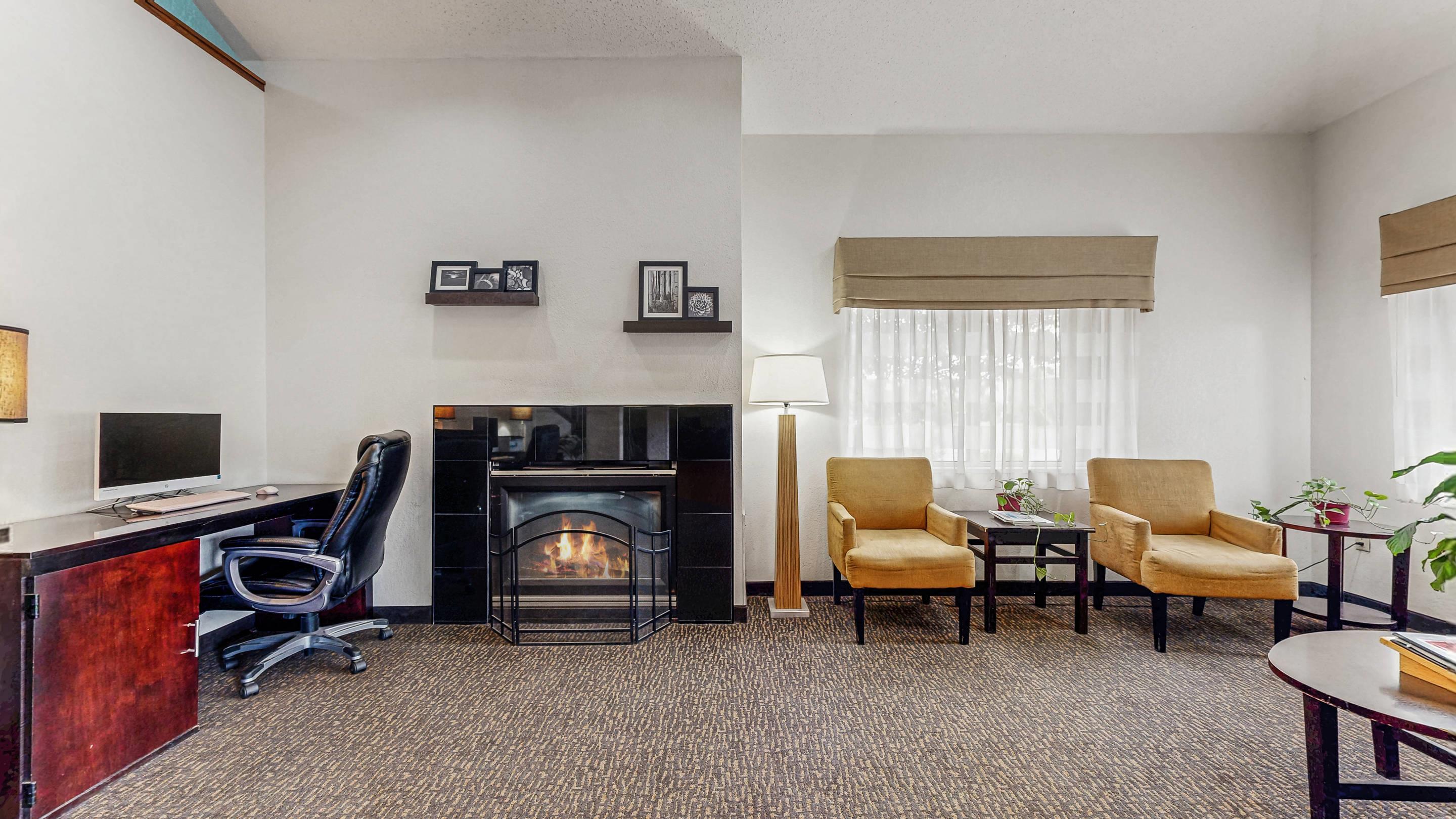 Spacious lobby with sitting area | Sleep Inn & Suites Buffalo Airport