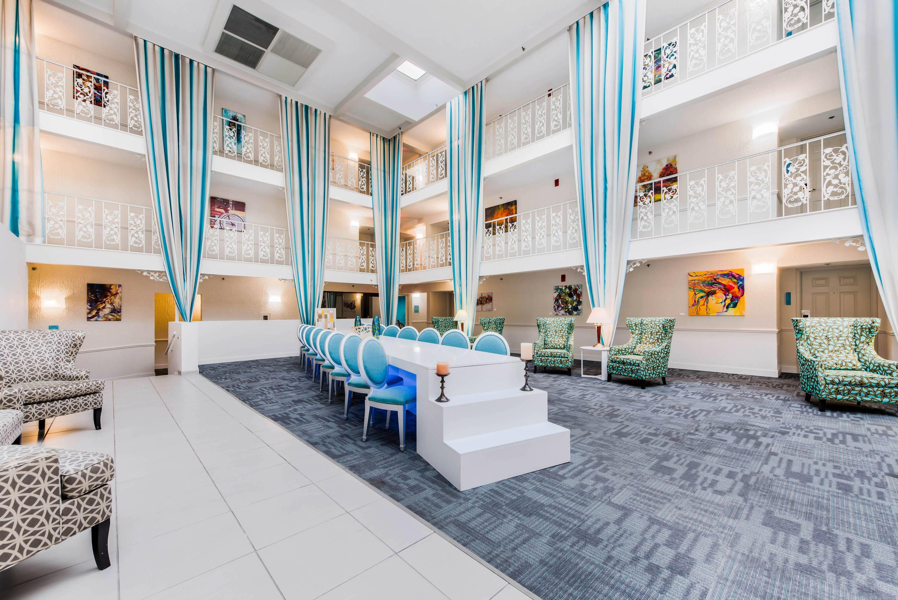 Spacious lobby with sitting area | The Blu Hotel Blue Ash Cincinnati, Ascend Hotel Collection