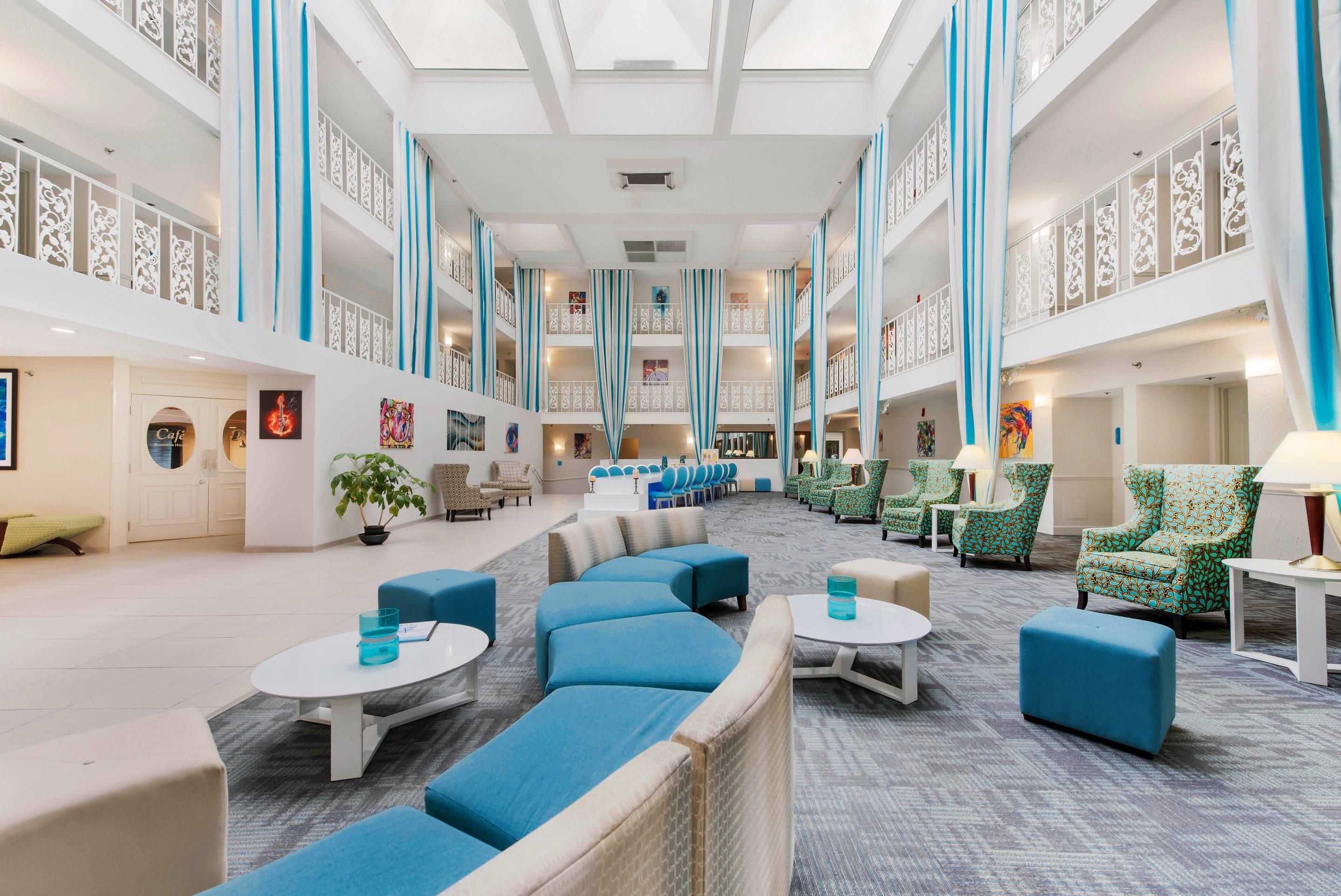 Spacious lobby with sitting area | The Blu Hotel Blue Ash Cincinnati, Ascend Hotel Collection