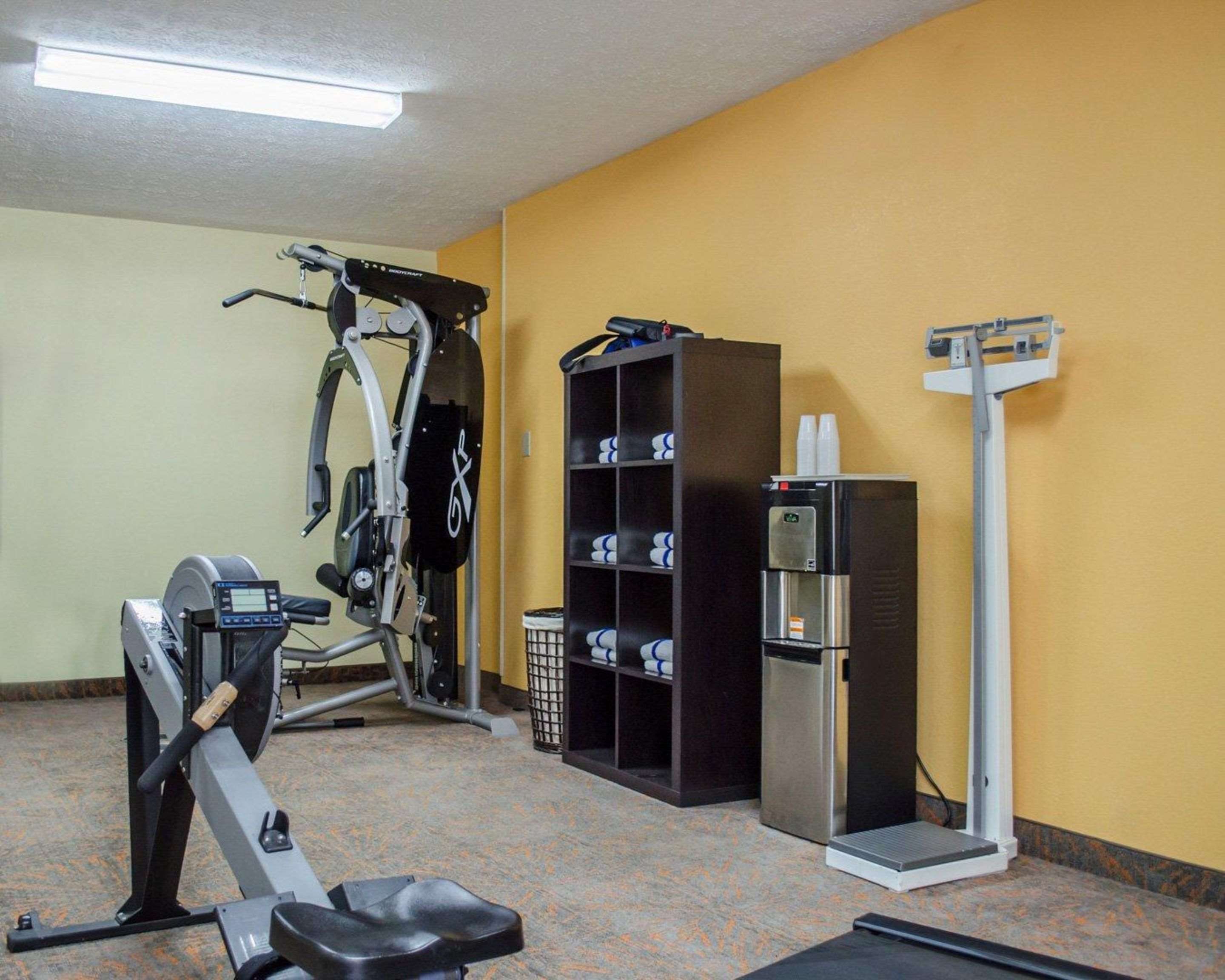 Exercise room with cardio equipment and weights | Quality Inn & Suites Medina - Akron West