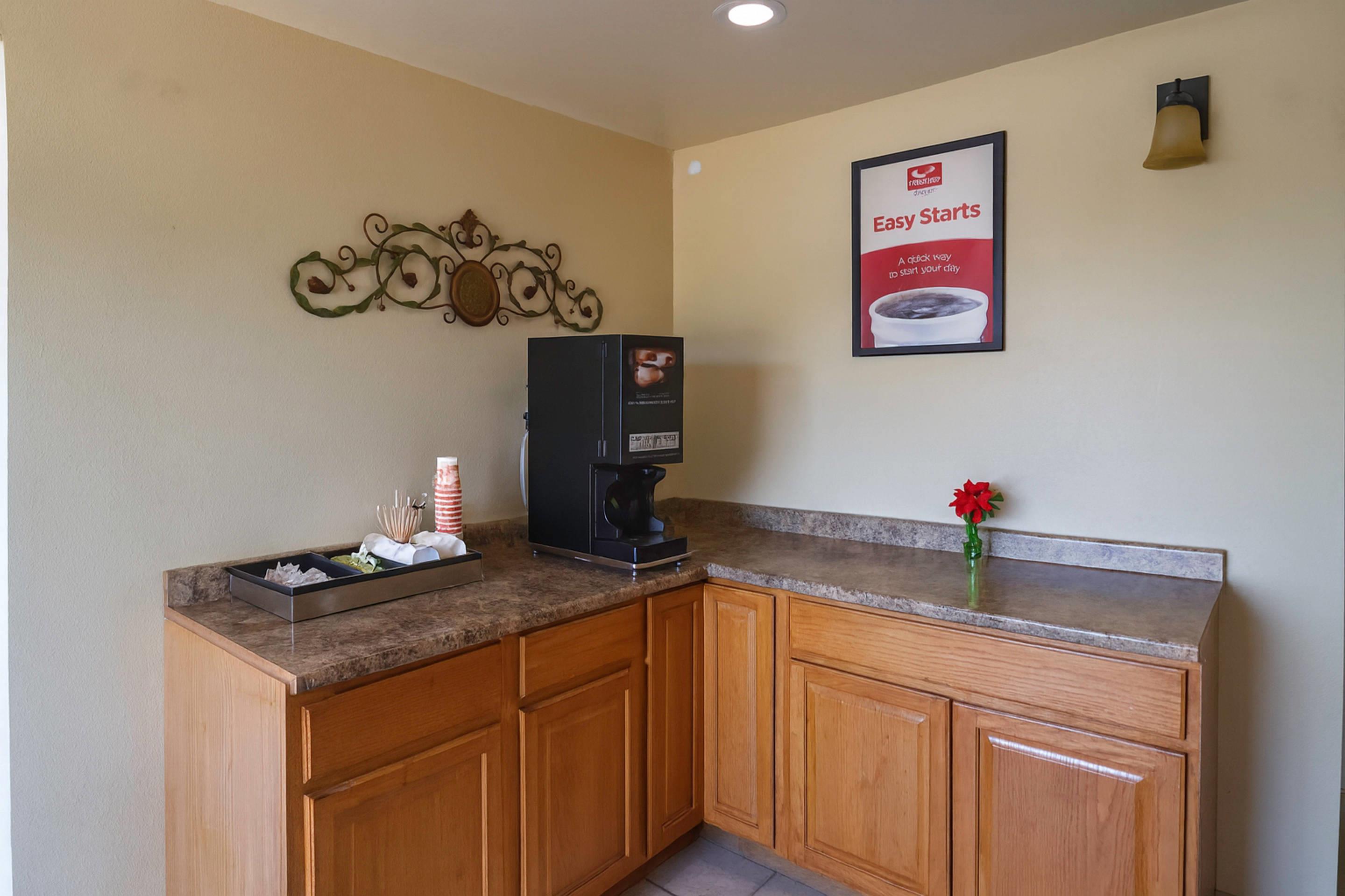 Enjoy coffee in the lobby | Rodeway Inn