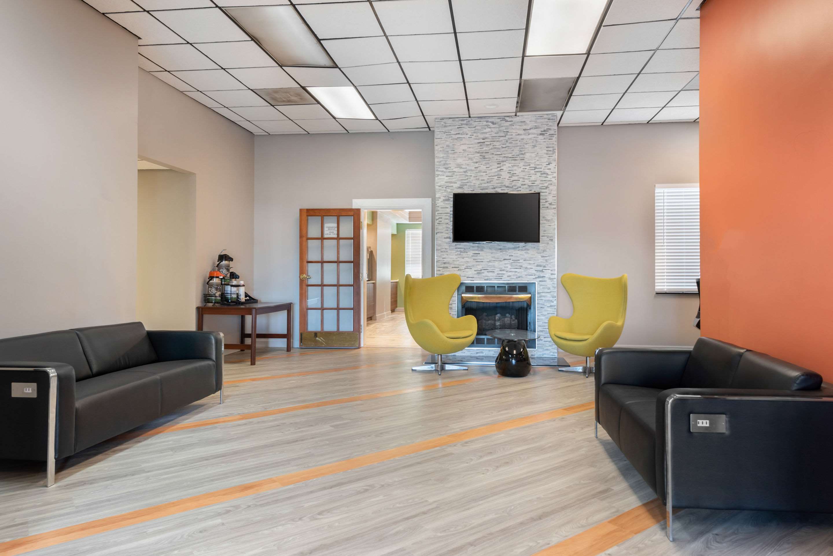 Spacious lobby with sitting area | Quality Inn - Fairborn
