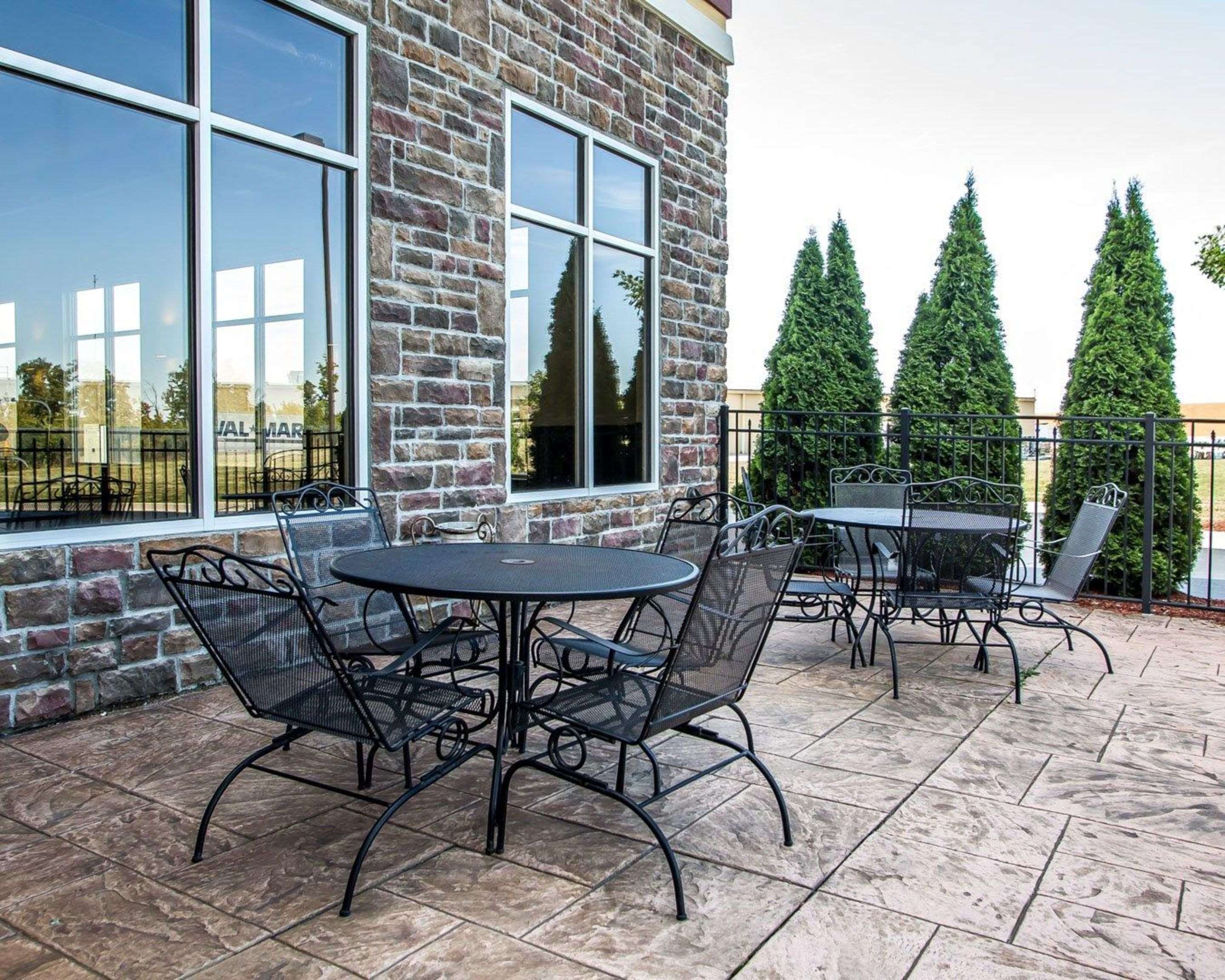 Relax on the hotel patio | Comfort Suites Troy-I75