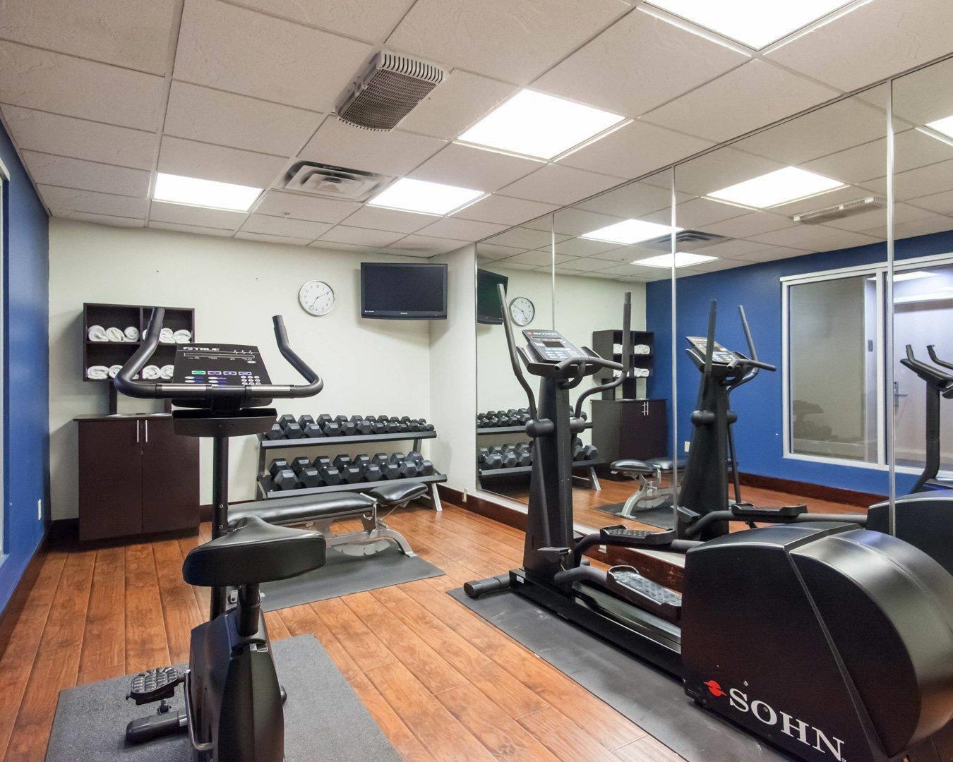 Exercise room with cardio equipment | Comfort Suites Central/I-44