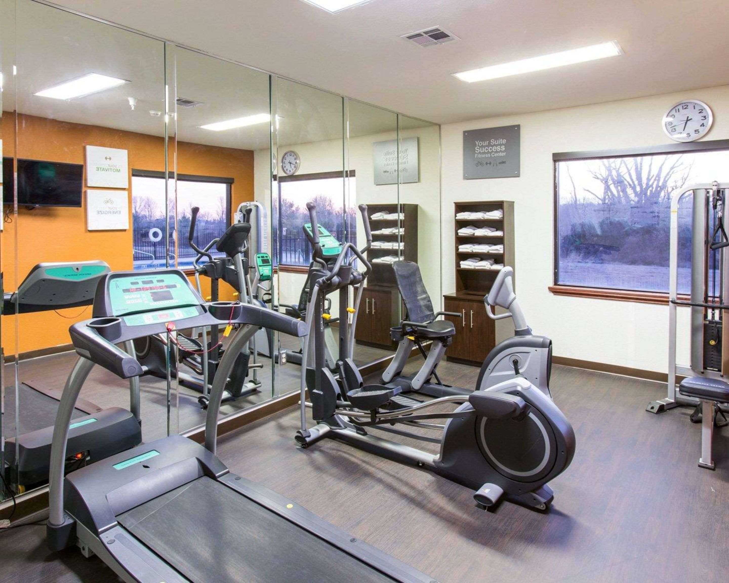 Fitness center with cardio equipment and weights | Comfort Suites Idabel