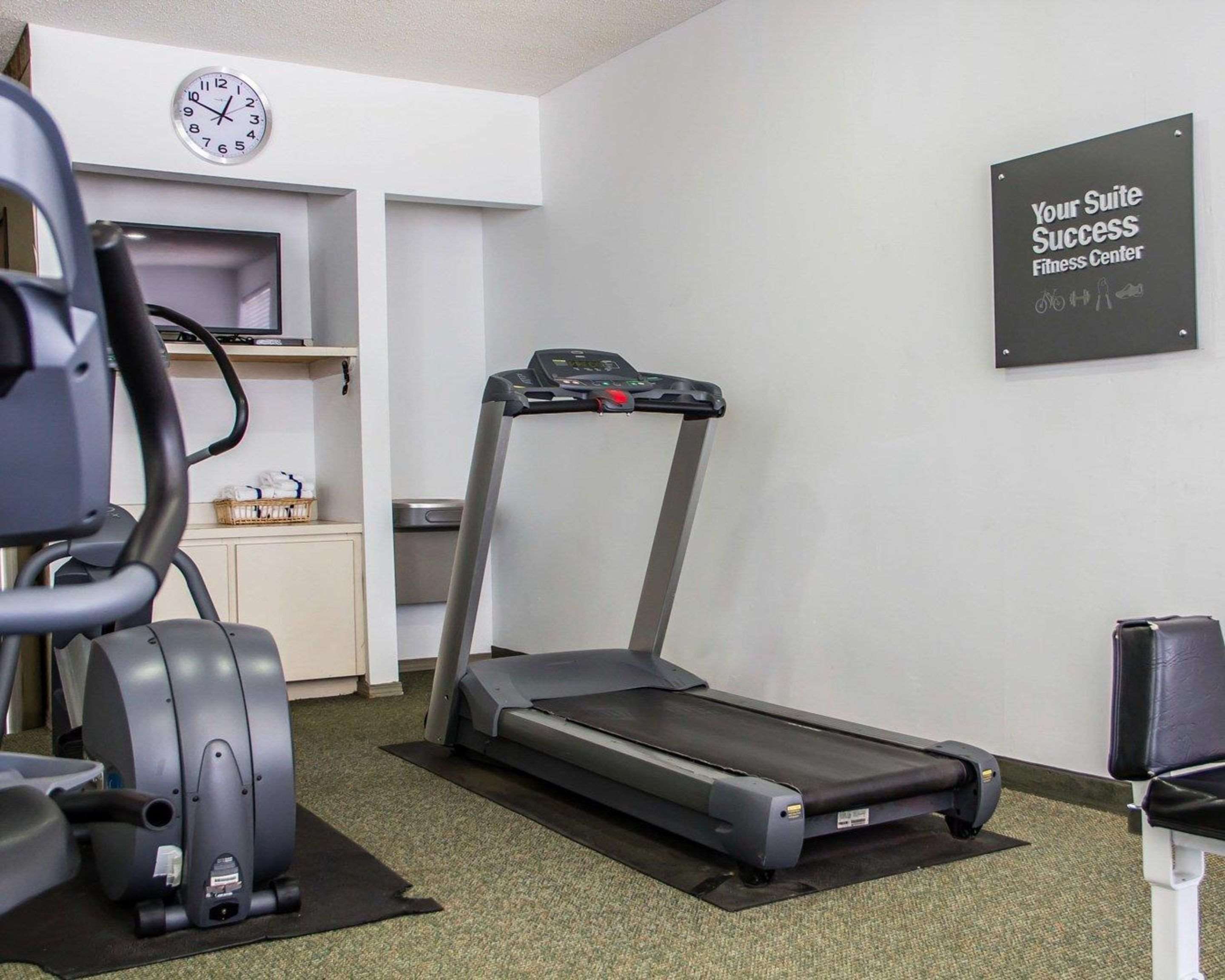 Fitness center with cardio equipment and weights | Comfort Suites McAlester